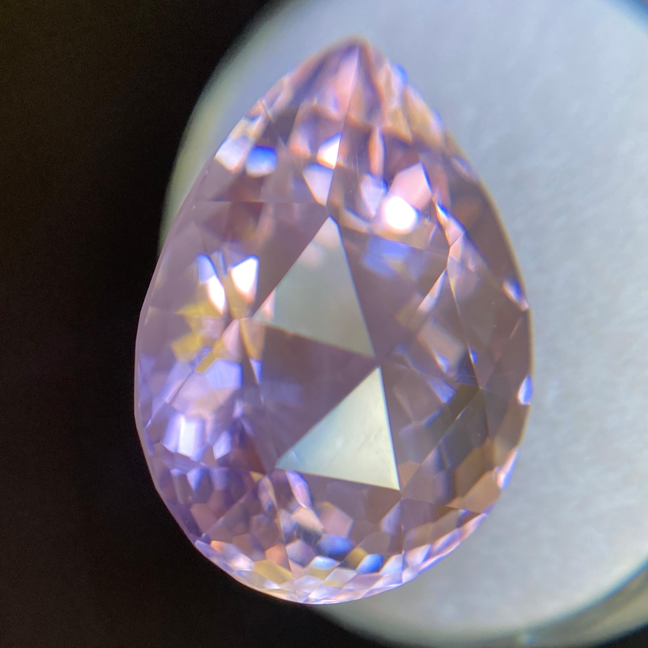 Fine Natural Purple Amethyst Gemstone.

Large 20.79 carat with a beautiful ‘Rose De France’ purple colour and excellent clarity - very clean gem.

Also has an excellent fancy rose pear cut with ideal polish to show great shine and colour, would look