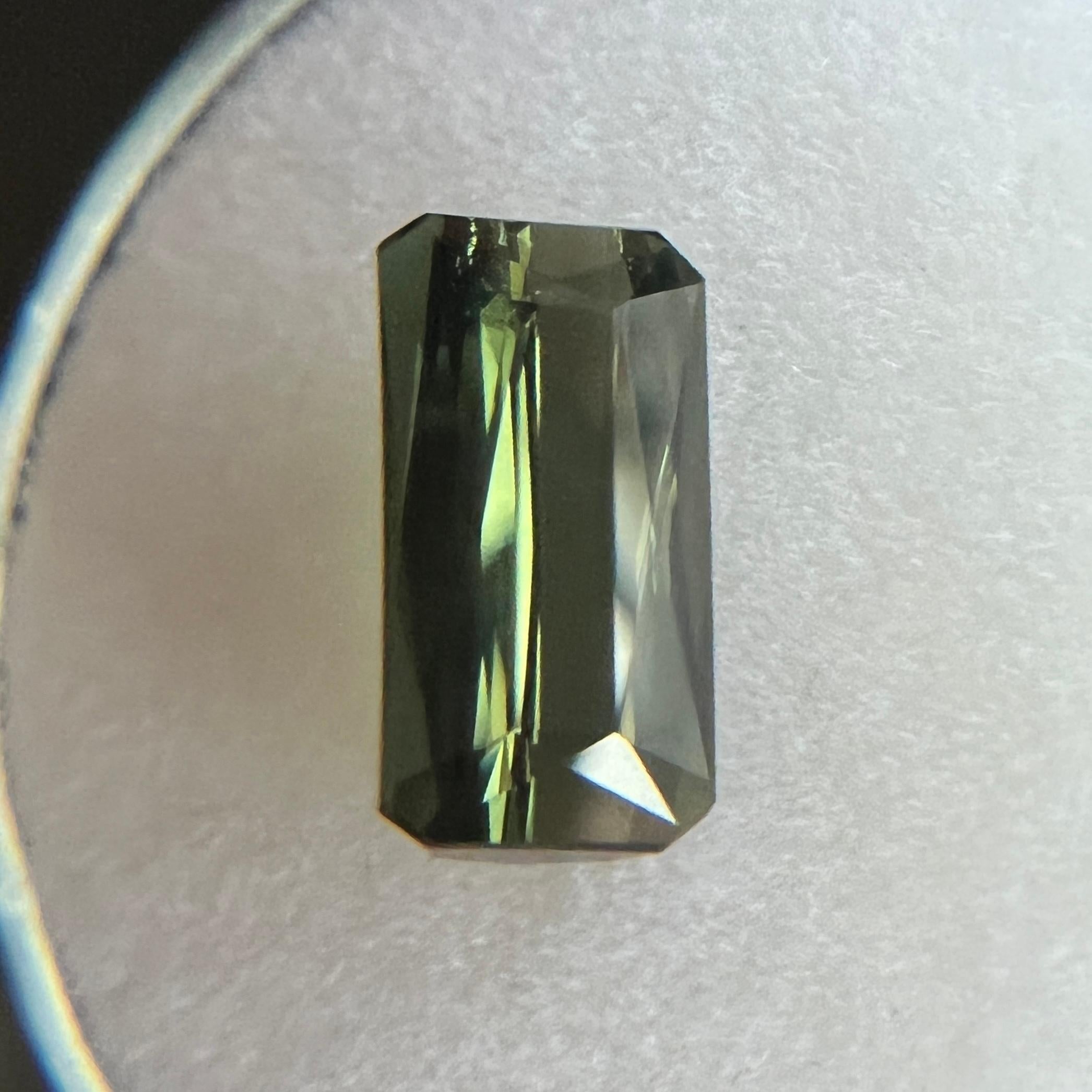 Fine Vivid Green Tourmaline Gemstone.

2.33 Carat with a beautiful and vibrant vivid green colour and excellent clarity, a very clean stone.

Also has an excellent fancy scissor emerald/octagon cut with good proportions and symmetry. Shows lots of