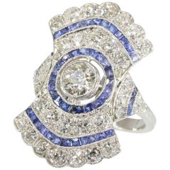 Fine 2.52 Carat Diamond
Blue Sapphire Platinum Radiating Ring, 1920s Fine 2.52 Carat Diamond
Blue Sapphire Platinum Radiating Ring, 1920s