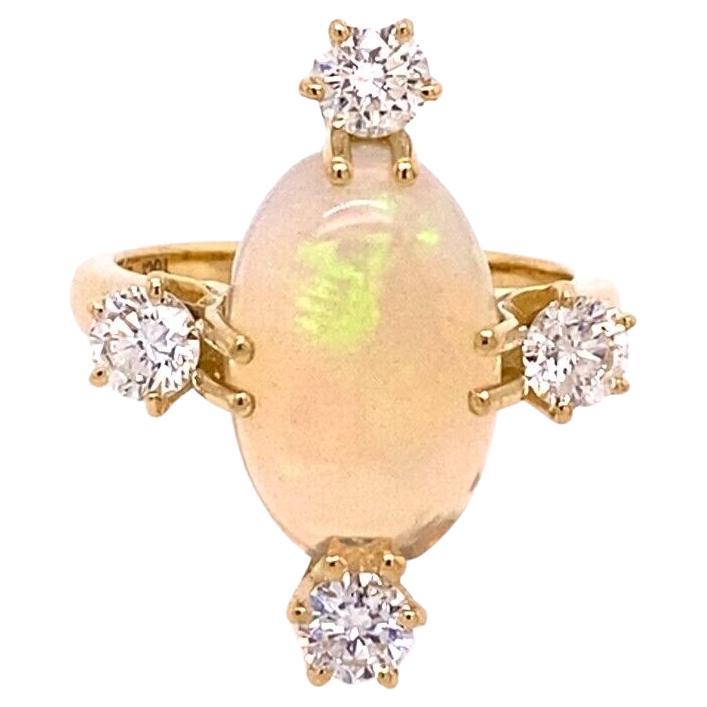 Fine 3.85ct Natural Oval Opal Surrounded by 4 Diamonds in 18ct Yellow Gold For Sale
