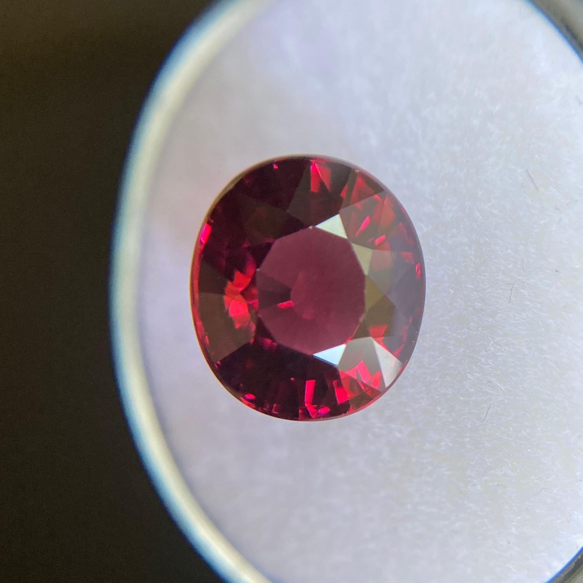 Fine Large Natural Vivid Red Rhodolite Garnet Gem.

5.02 Carat with a beautiful vivid purple red colour and excellent clarity, a very clean stone with only some very small natural inclusions visible when looking closely.

Also has an excellent oval