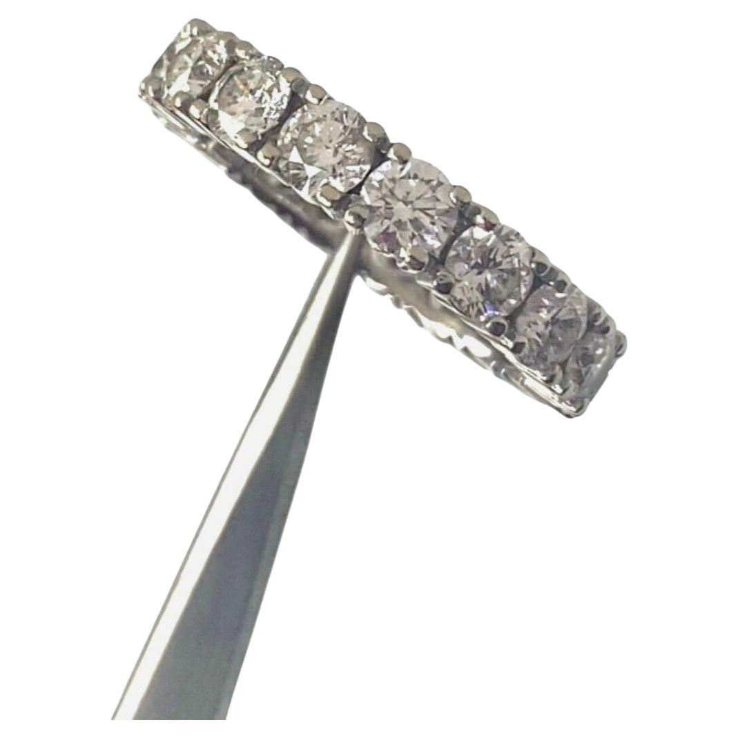 Classic estate diamond eternity band Anniversary, wedding ring features 18 round brilliant cut diamonds Color G-H, and Clarity SI1 set in a prong setting 14K white gold with a total weight of 5.40 carat.
18 Diamonds Not Enhanced 0.30 Carats Each