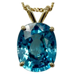 Collana con ciondolo in oro giallo 18 ct. 6,15 ct. di zircone blu naturale taglio ovale