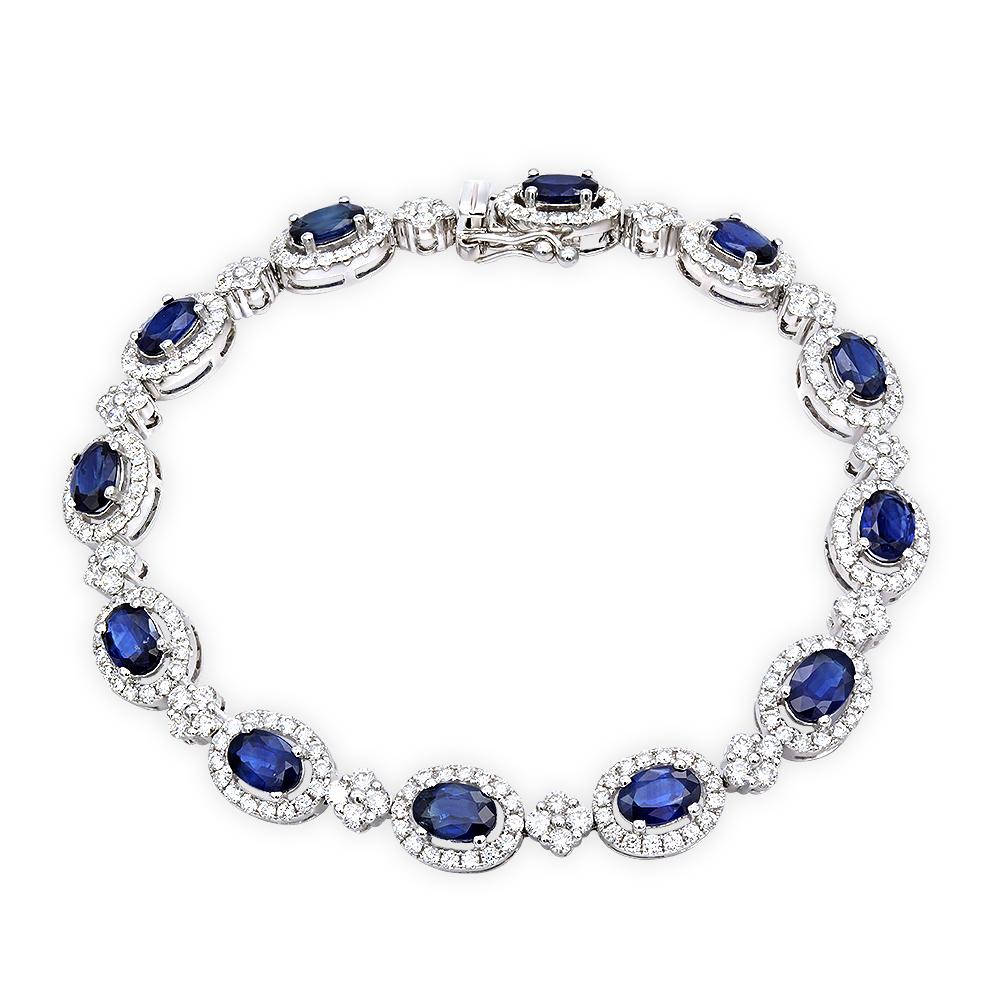 This sapphire and diamond Eternity bracelet combines classic tennis bracelet style encircles your wrist with a colorful blue hue. Deep blue oval-cut sapphires surrounded with round-brilliant cut diamond halos in a floral inspired pattern that adds