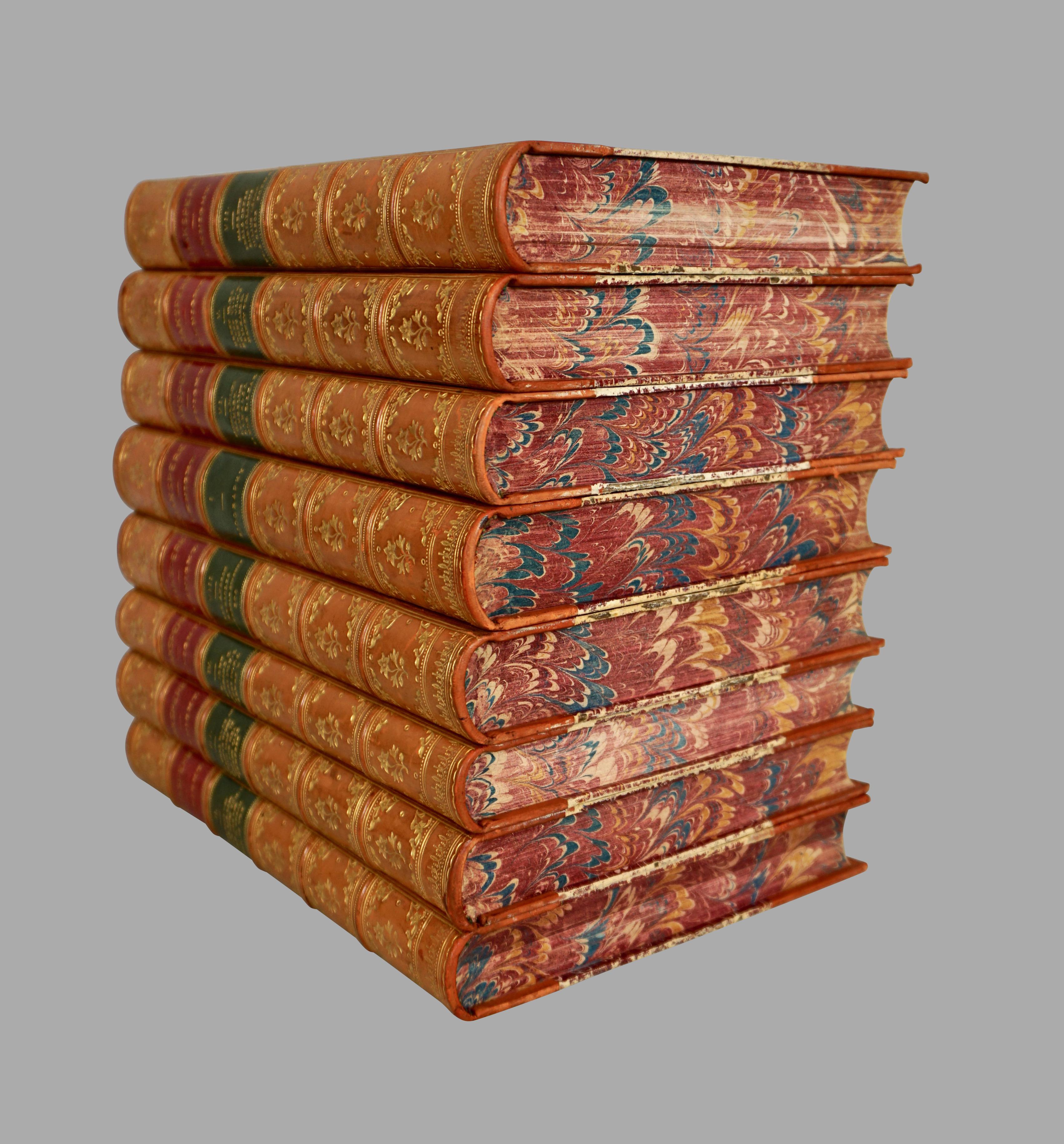 A very attractive 8 volume 3/4 leather bound set of the pictorial edition of the works of Shakespere (sic), the second revised edition published New York: George Routledge and Sons. The boards and end papers decorated with marbleized paper with