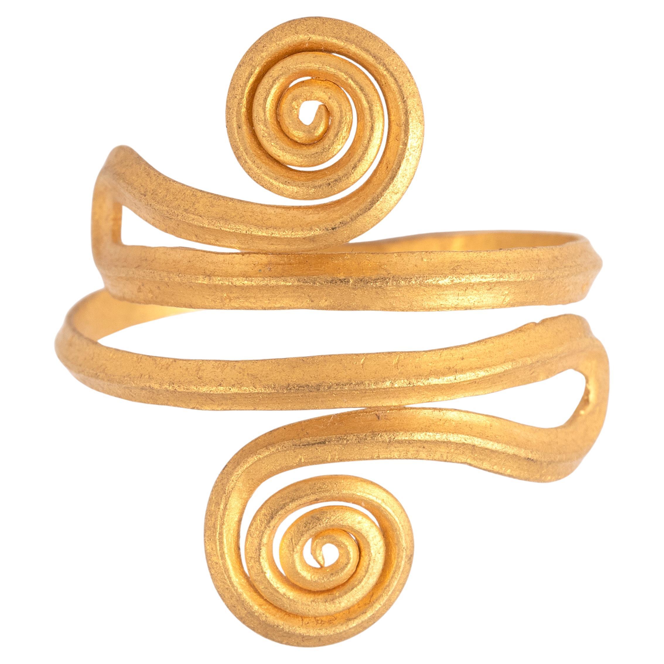 Raffinato anello greco antico a spirale in oro 22kt del IV/V secolo a.C.
