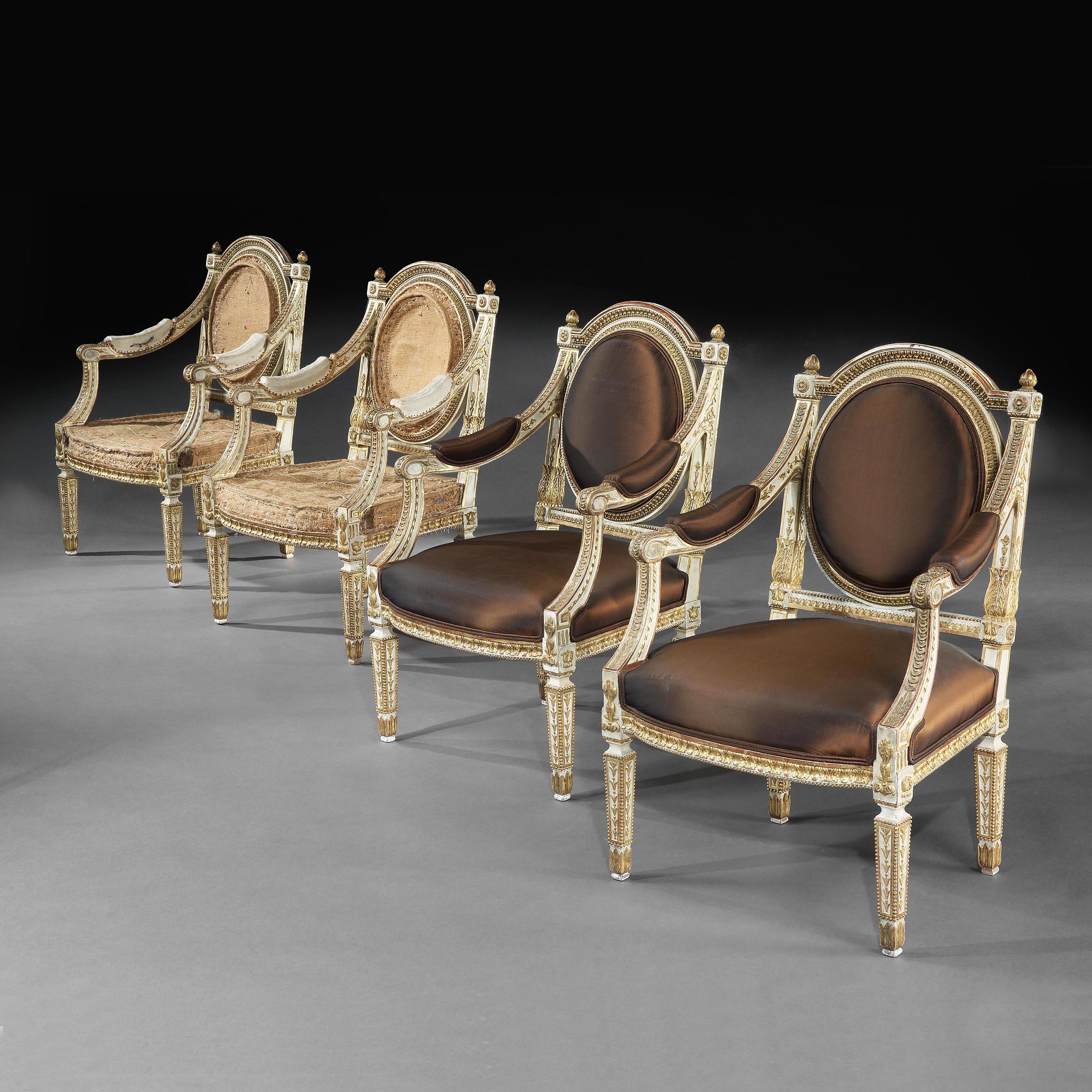 Extremely fine and decorative pair of 19th century Italian painted and parcel gilt armchairs of neoclassical design.

Italian, late 19th century, circa 1880-1900.

Oozing style these are very attractive parcel gilt armchairs, having husk and