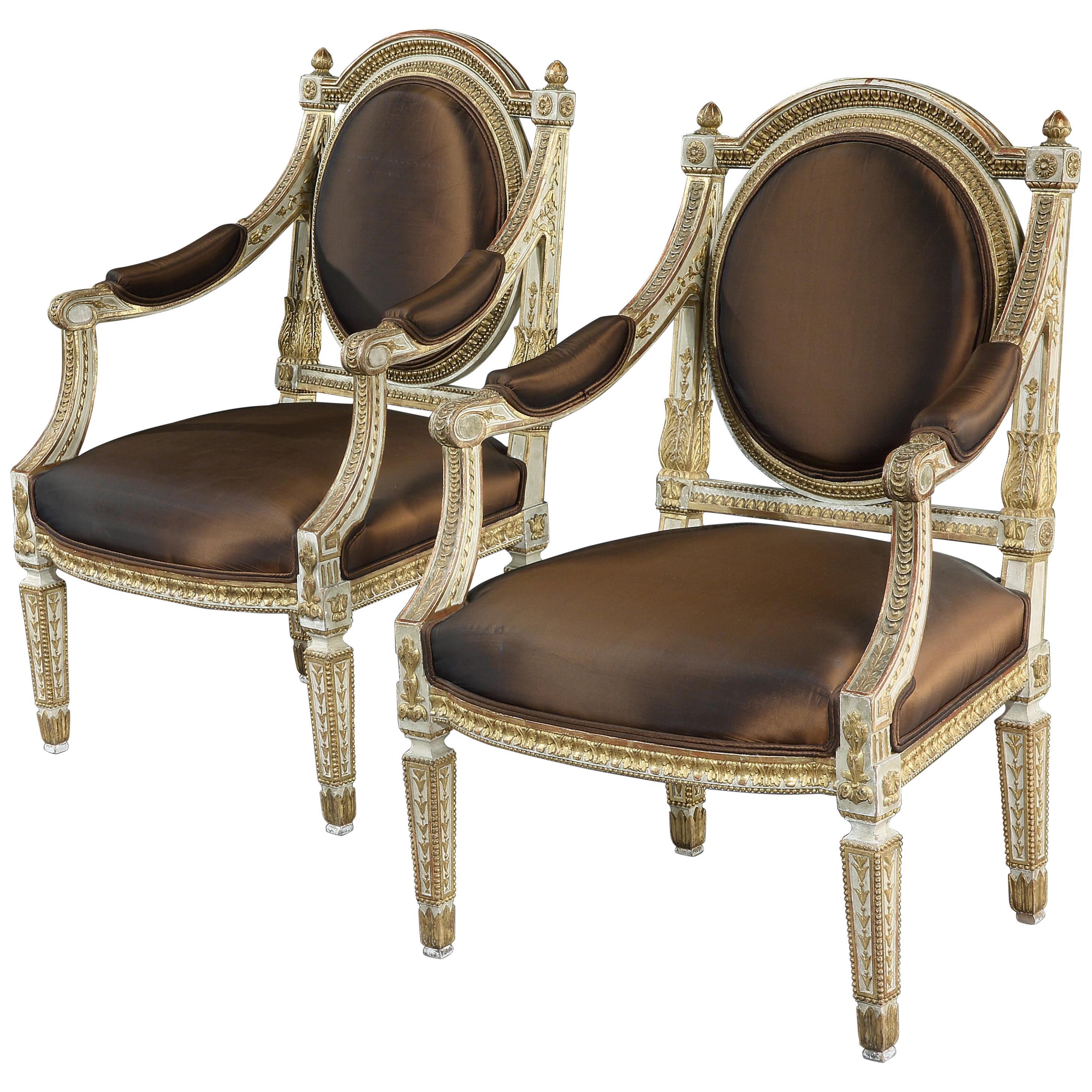 Fine and Decorative Pair of Italian Painted and Parcel Gilt Armchairs of