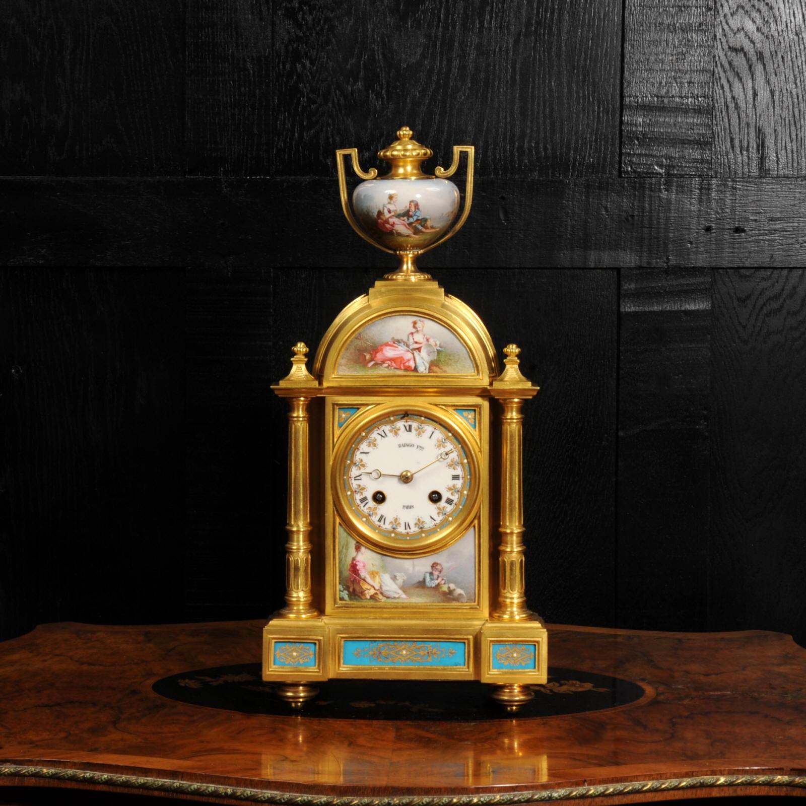 A fine and early clock, the case by Henri Picard of Paris and the movement by Raingo Frères. It is beautifully made of ormolu (mercury fire gilded bronze doré) mounted with exquisitely painted Sèvres style porcelain with a Bleu Celeste ground. The