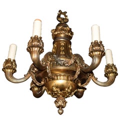 Lustre néoclassique raffiné et élégant en bronze doré