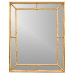 Bellissimo specchio vintage dorato di grandi dimensioni con cornice a sezioni