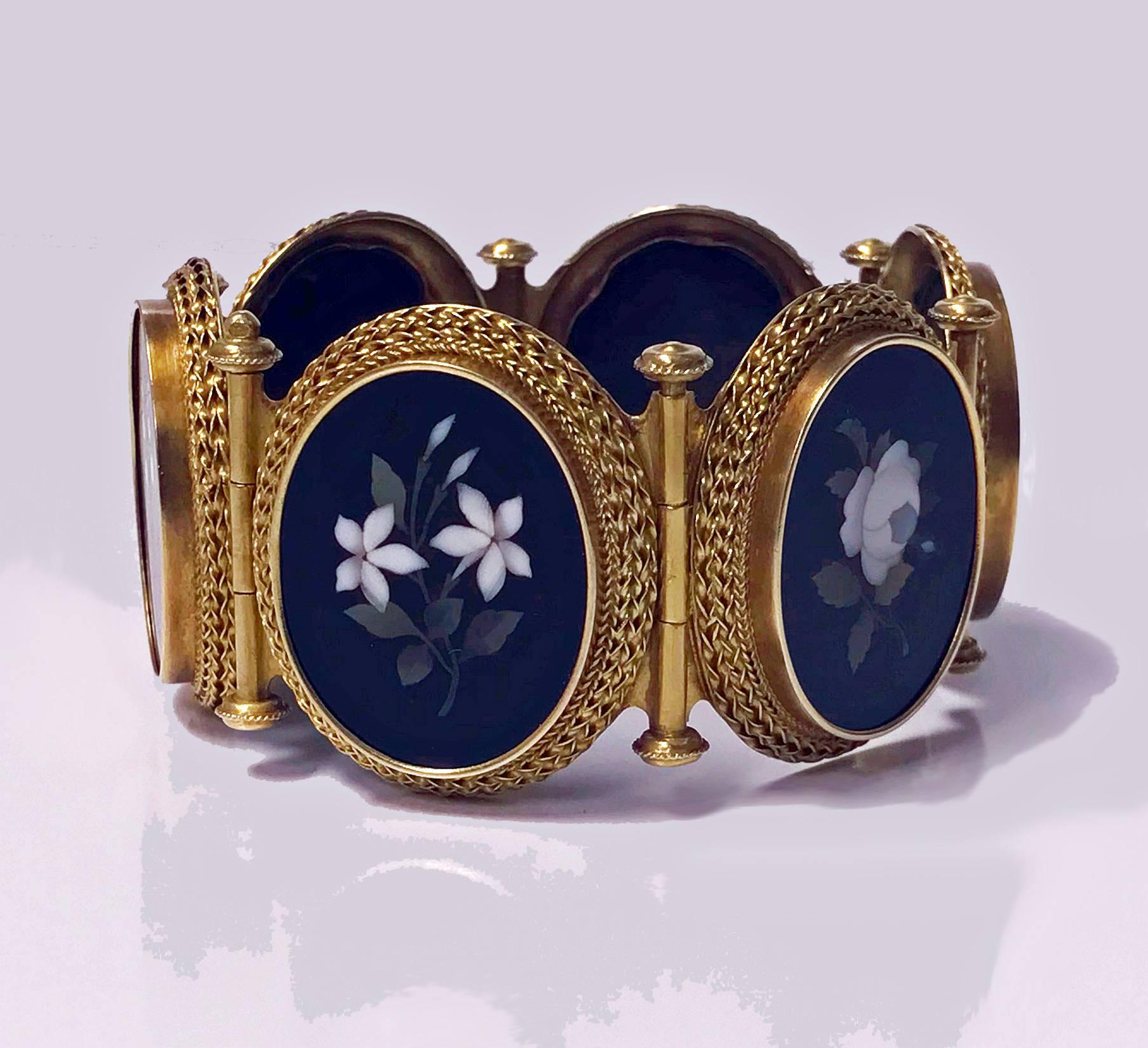 Very Fine 19th century 18K (tested) Gold Pietra Dura Bracelet, Italy C.1875. The bracelet with six  oval etruscan granular gold set pietra dura  depicting foliage, detachable hinged gold links between, terminating with link conforming as fastener.