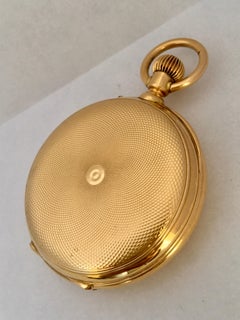Belle montre de poche ancienne en or 18 carats tournée à  moteur chasseur avec quart de chaîne