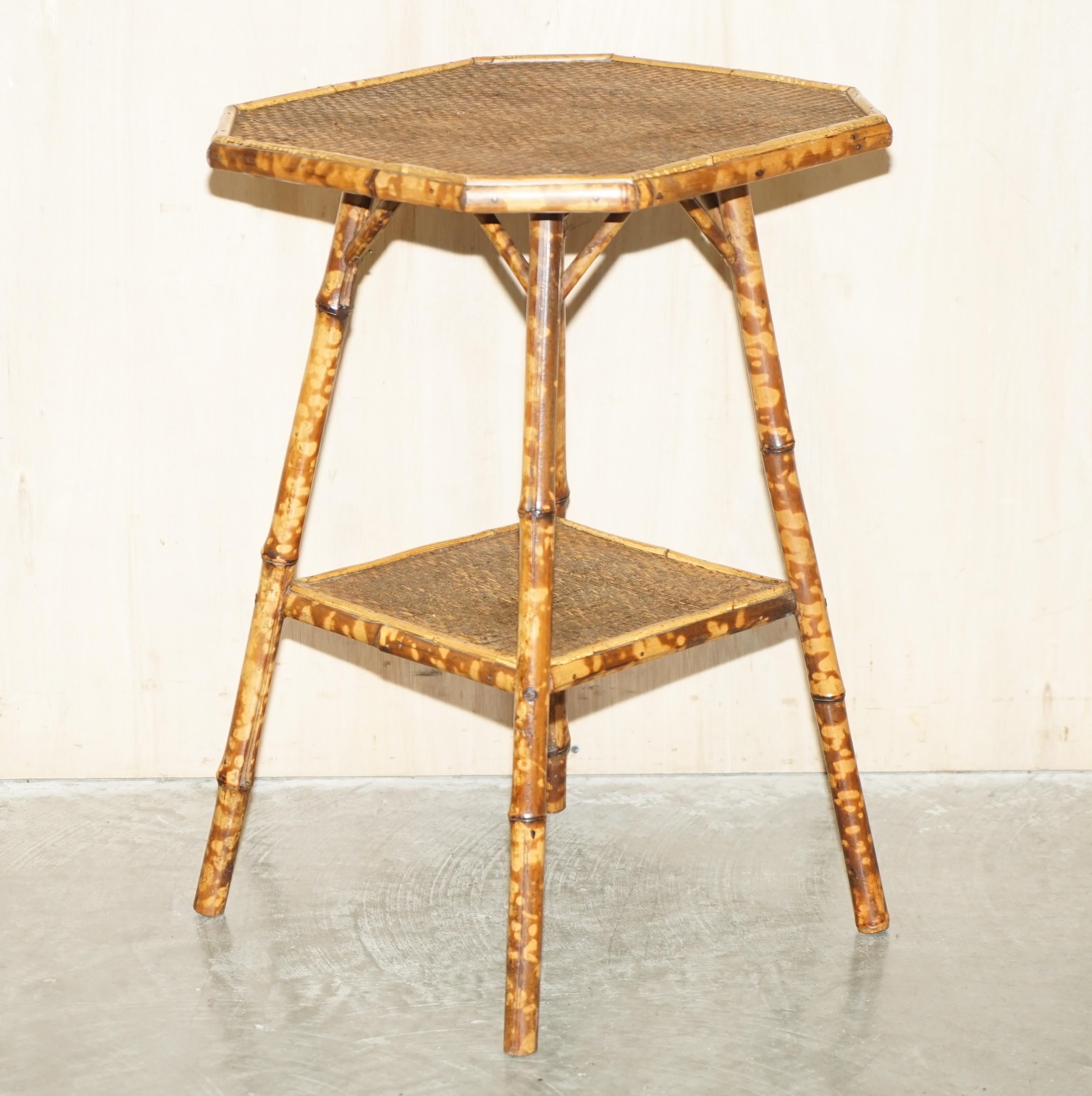 We are delighted to offer for sale this super collectable and original circa 1880 Antique Victorian Tiger Bamboo side table with period rattan woven top and tortoises shell patina 

A very good looking well-made and highly decorative table. These