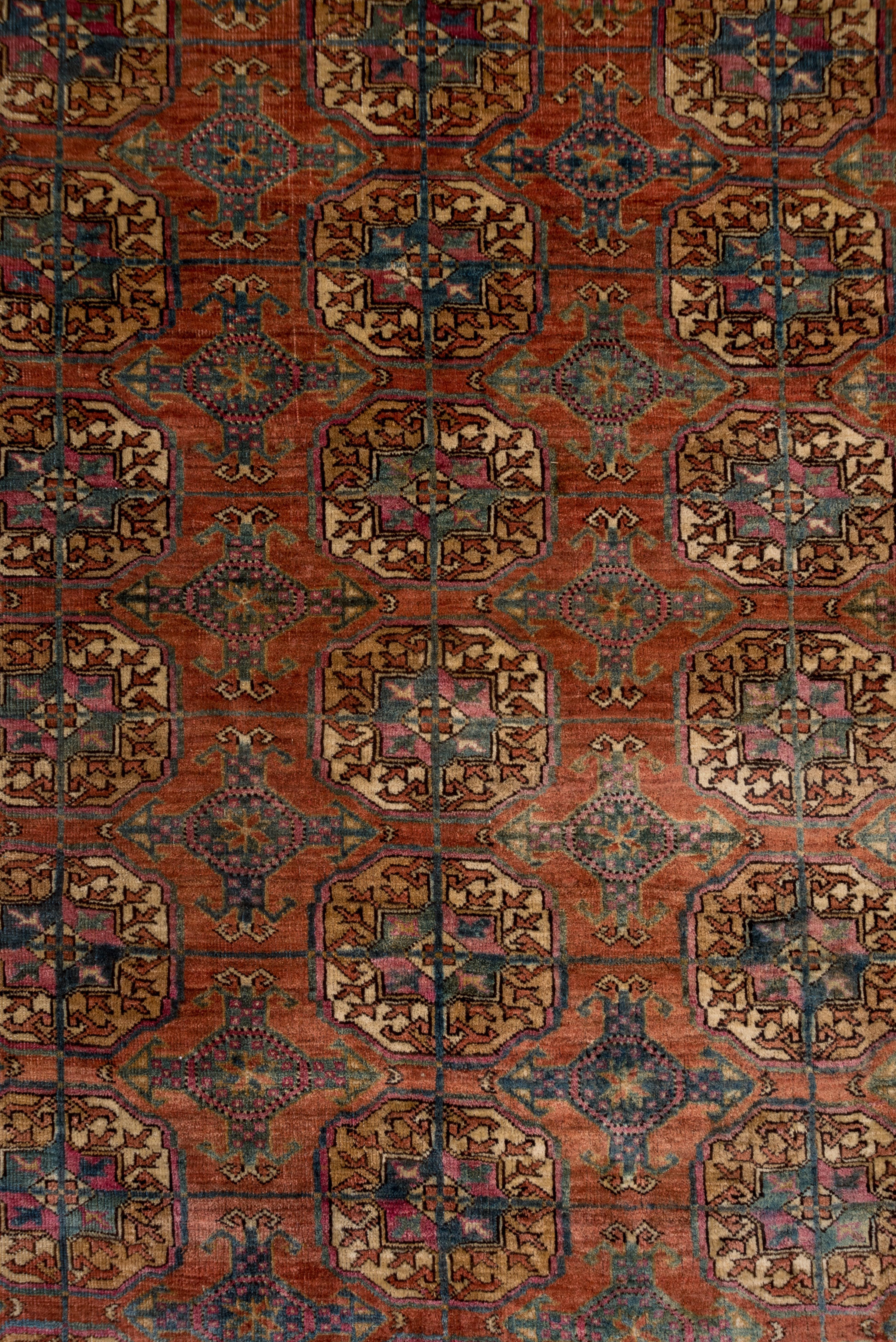 Hand-Knotted Fine Antique Afghan Bokara Rug, Red & Rust Allover Field, Blue Accents For Sale