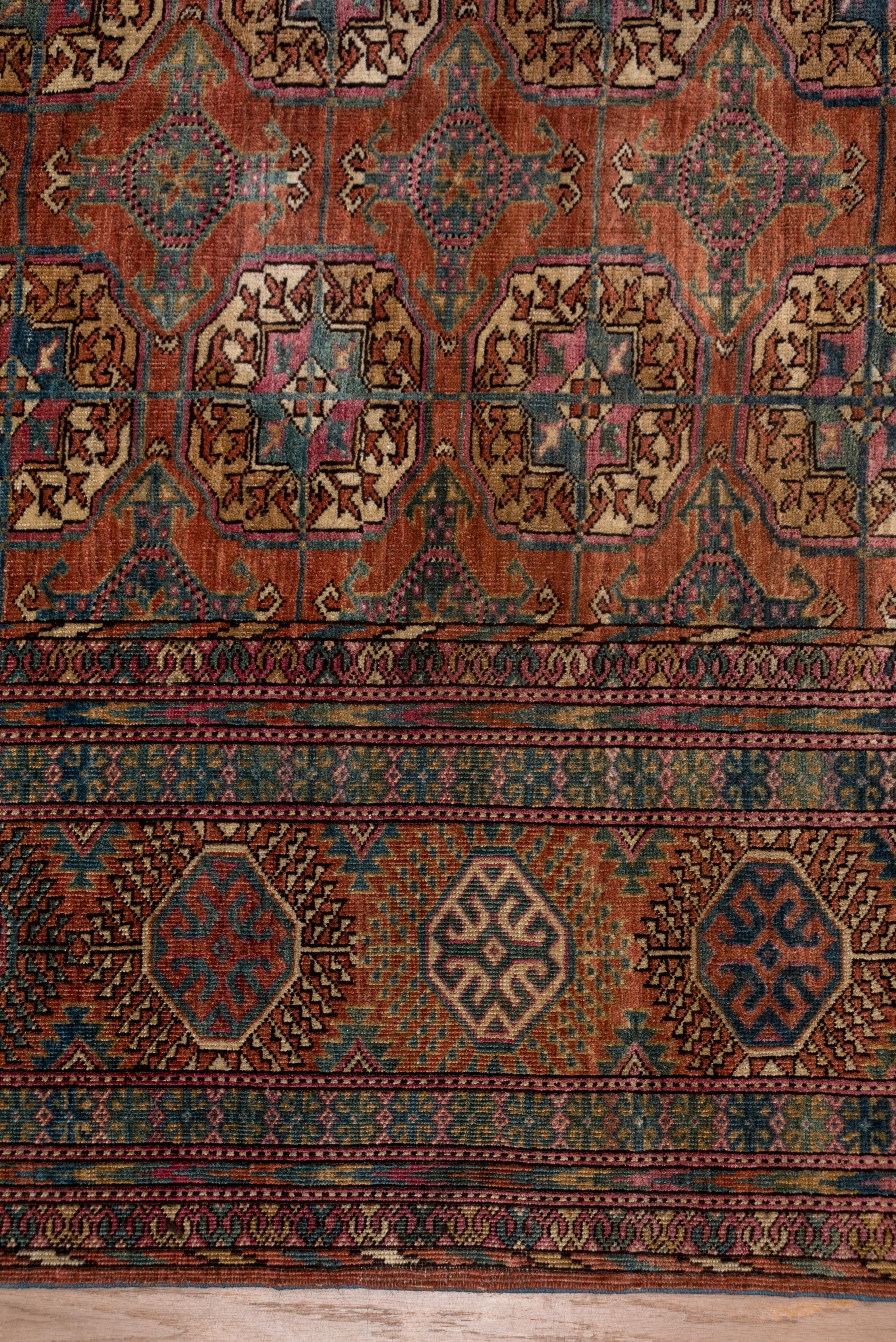Antiker afghanischer Bokara-Teppich, rot und rostfarben, Allover-Fuß, blaue Akzente (Handgeknüpft) im Angebot