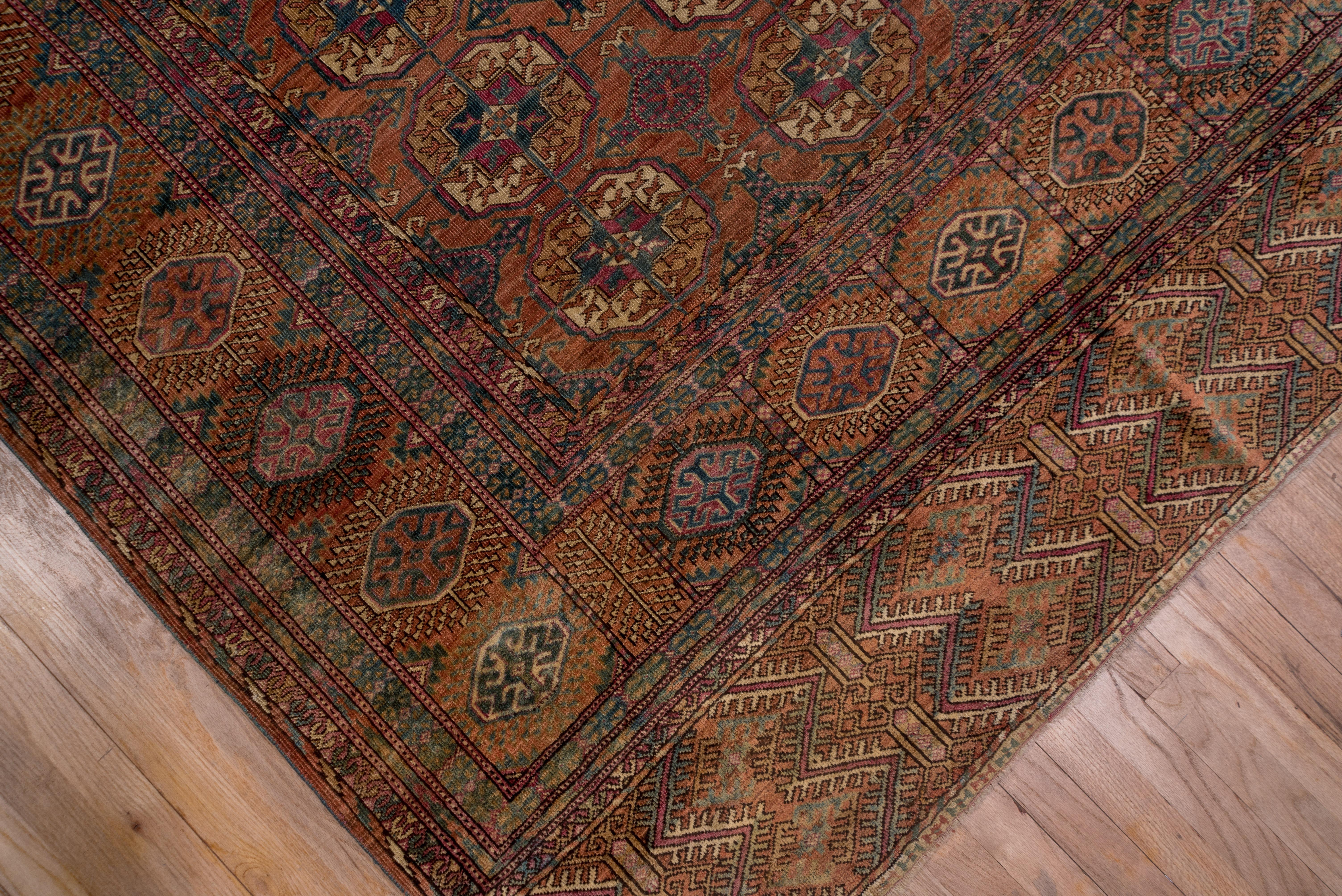 Early 20th Century Fine Antique Afghan Bokara Rug, Red & Rust Allover Field, Blue Accents For Sale