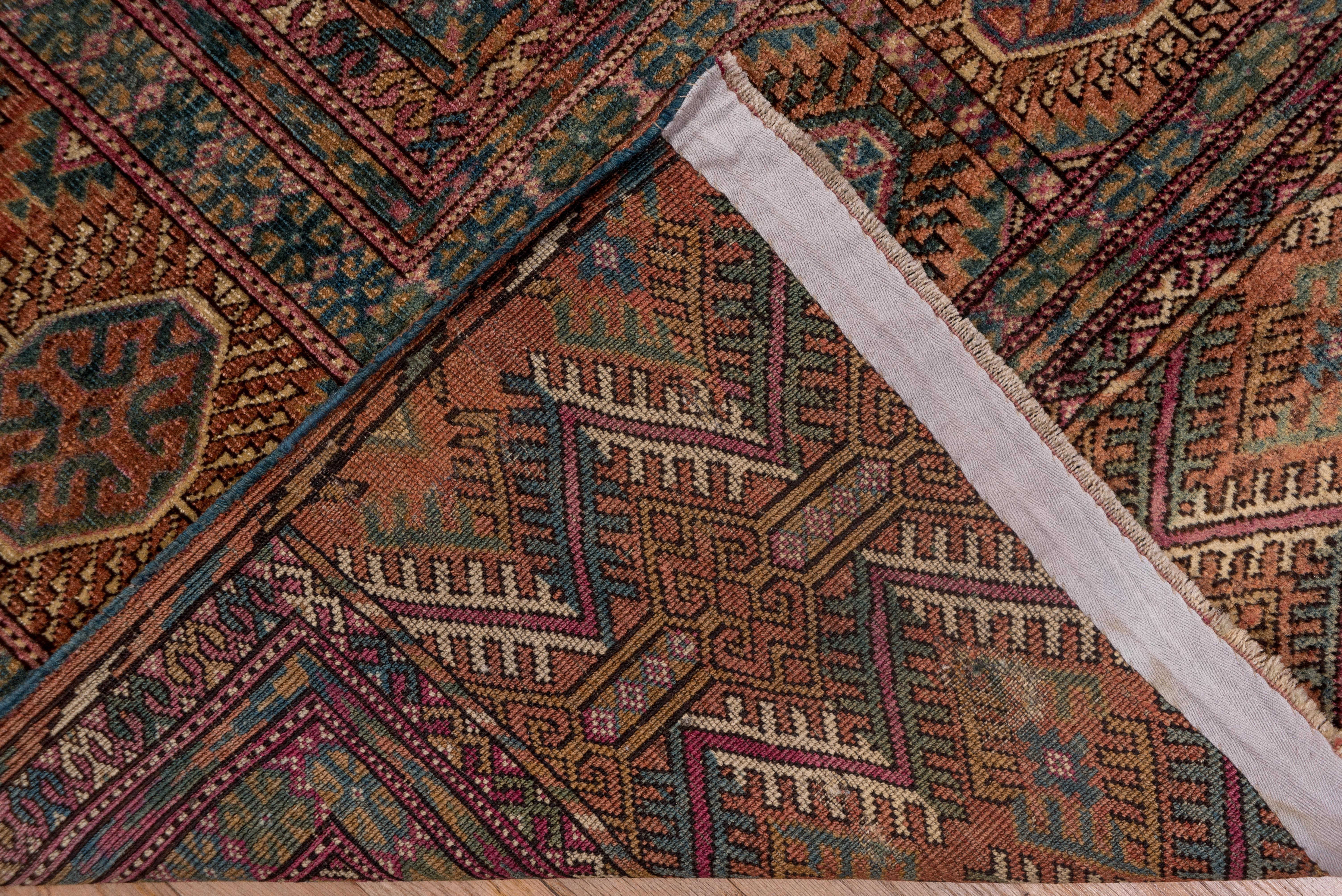 Antiker afghanischer Bokara-Teppich, rot und rostfarben, Allover-Fuß, blaue Akzente (Frühes 20. Jahrhundert) im Angebot