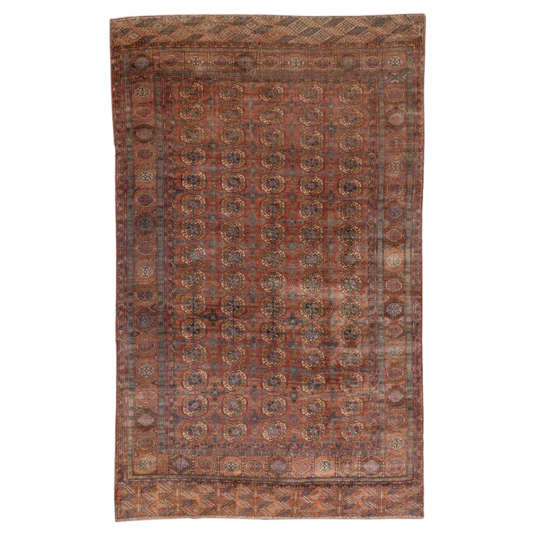 Fine Antique Afghan Bokara Rug, Red and Rust Allover Field, Blue Accents For Sale at 1stDibs