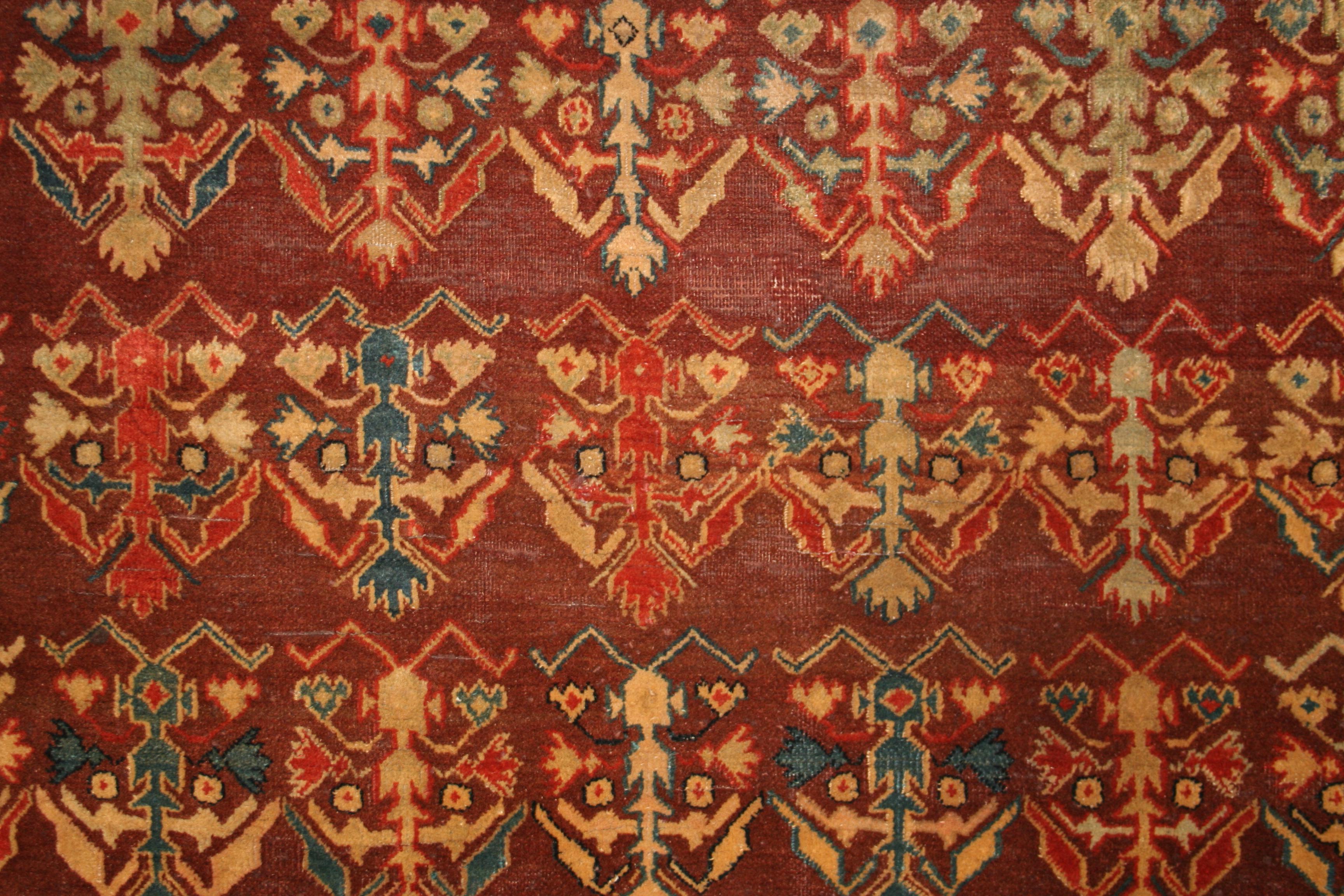 Indian Fine Antique Agra Rug with All-Over Shrub Pattern on a Maroon Background For Sale