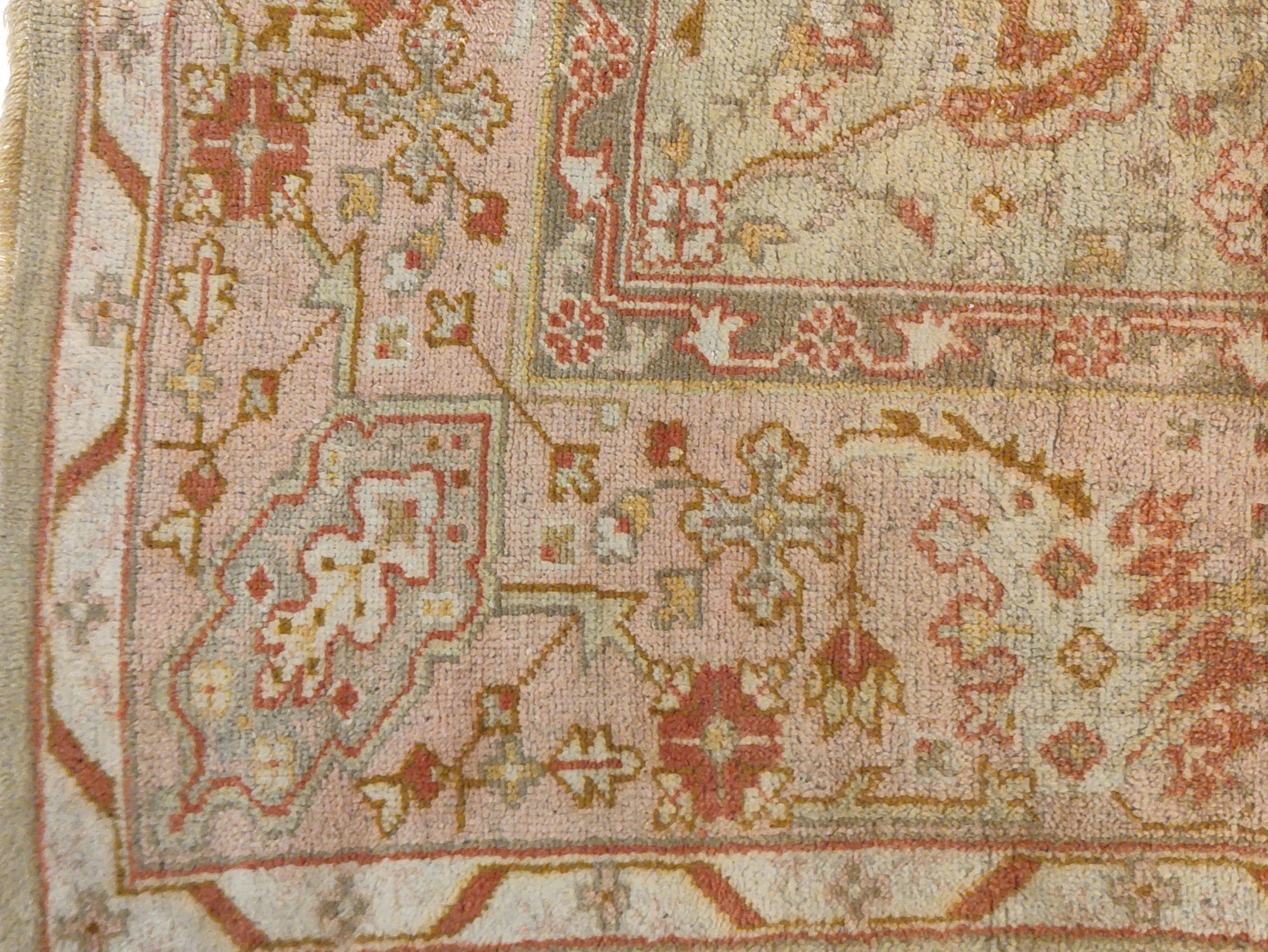 Antique Oushak carpets are heirs of a very long standing tradition. As rugs of this type were woven in western Anatolia since the Golden Age of the Ottoman empire in the 16th century. Originally referred to in the trade as 'Turkey' carpets, these