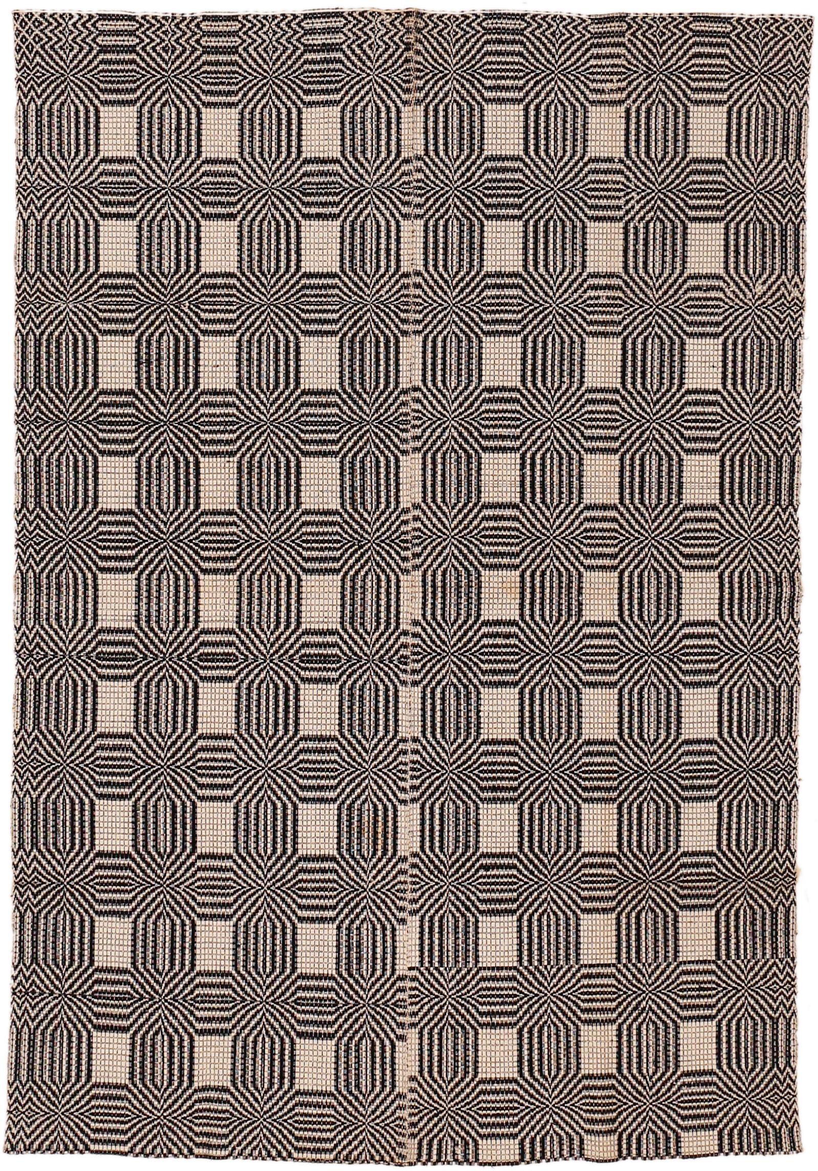 A very charming antique North American reversible cotton coverlet with a geometric repeat pattern. The white and black palette and the fresh texture obtained from cotton makes it a rug that is very easy and pleasant to live with.
 