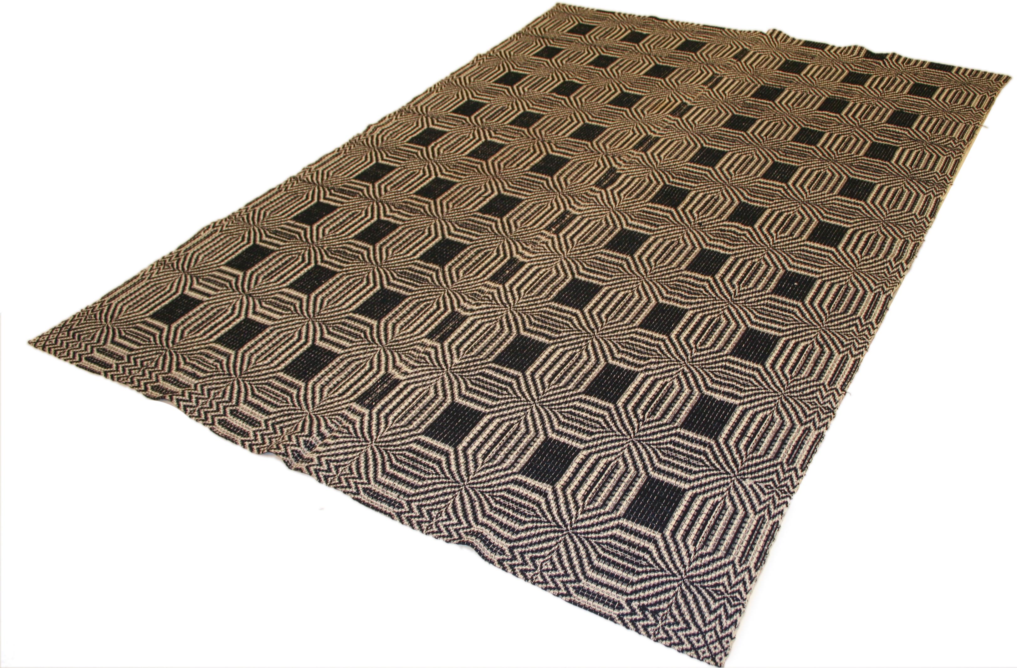 black and ivory geometric rug
