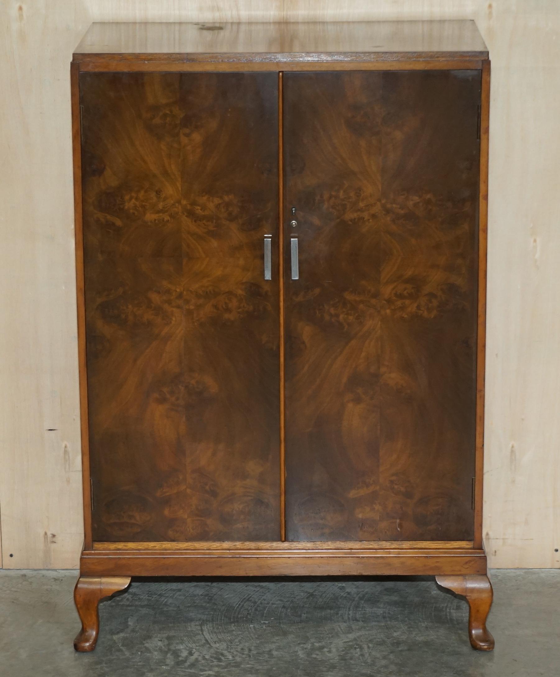 Royal House Antiques

Royal House Antiques is delighted to offer for sale this stunning original Art Deco Burr Walnut Waring & Gillow Housekeepers cupboard

Please note the delivery fee listed is just a guide, it covers within the M25 only for the