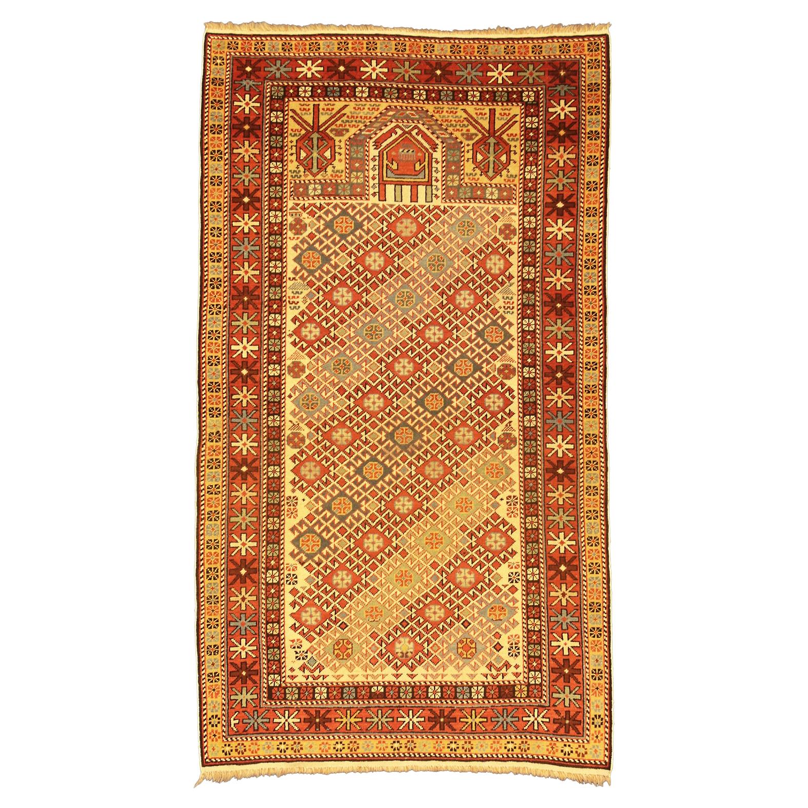 Fine tapis caucasien ancien Daghestan en laine beige et crème, vers 1890