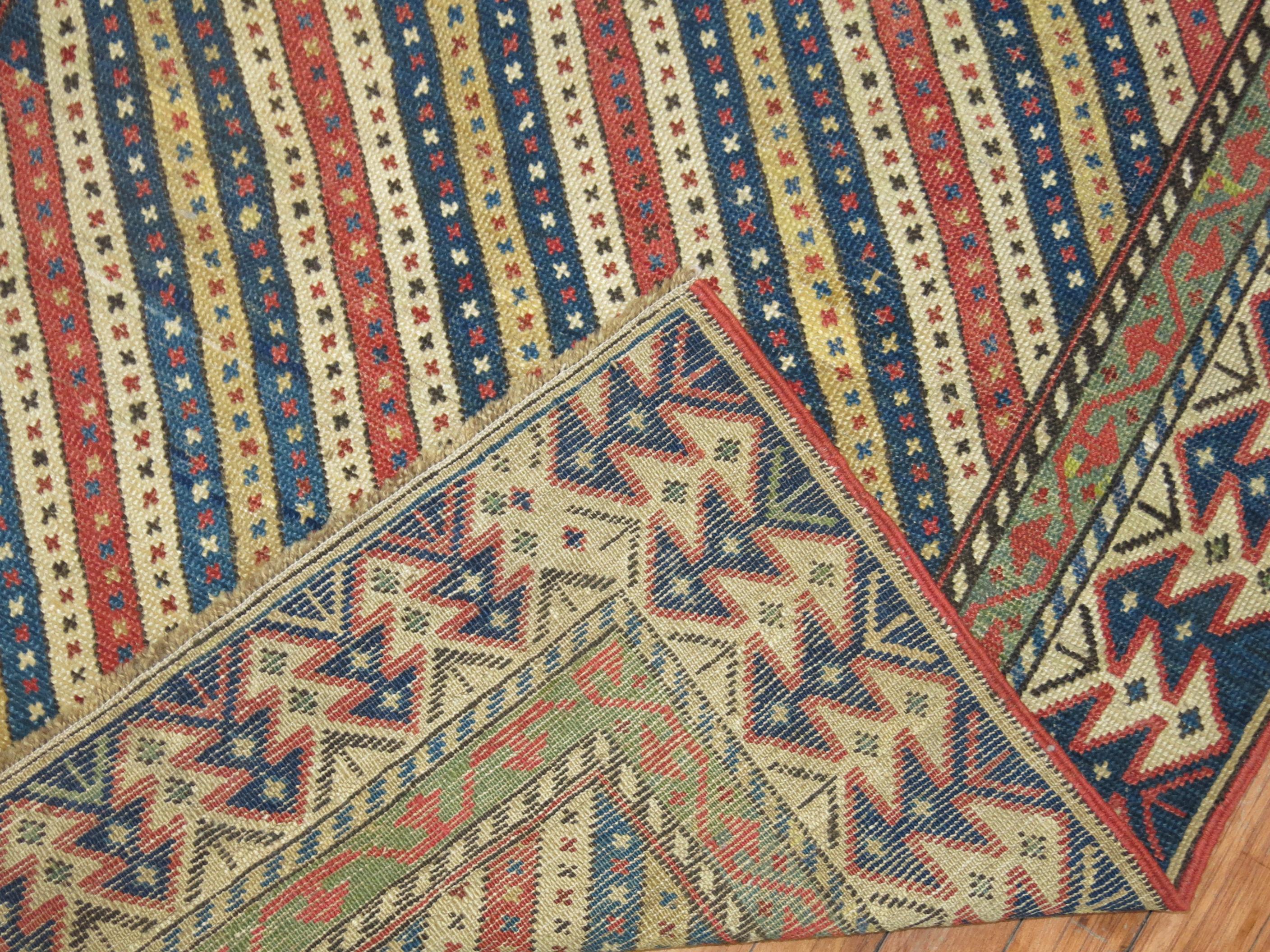 A 19th century Caucasian Kuba runner. Colors and dyes all original. Very tightly woven.

The town of Kuba located in the caucases villages was a collection point for rugs from the eponymous mountainous region, due to its location on the