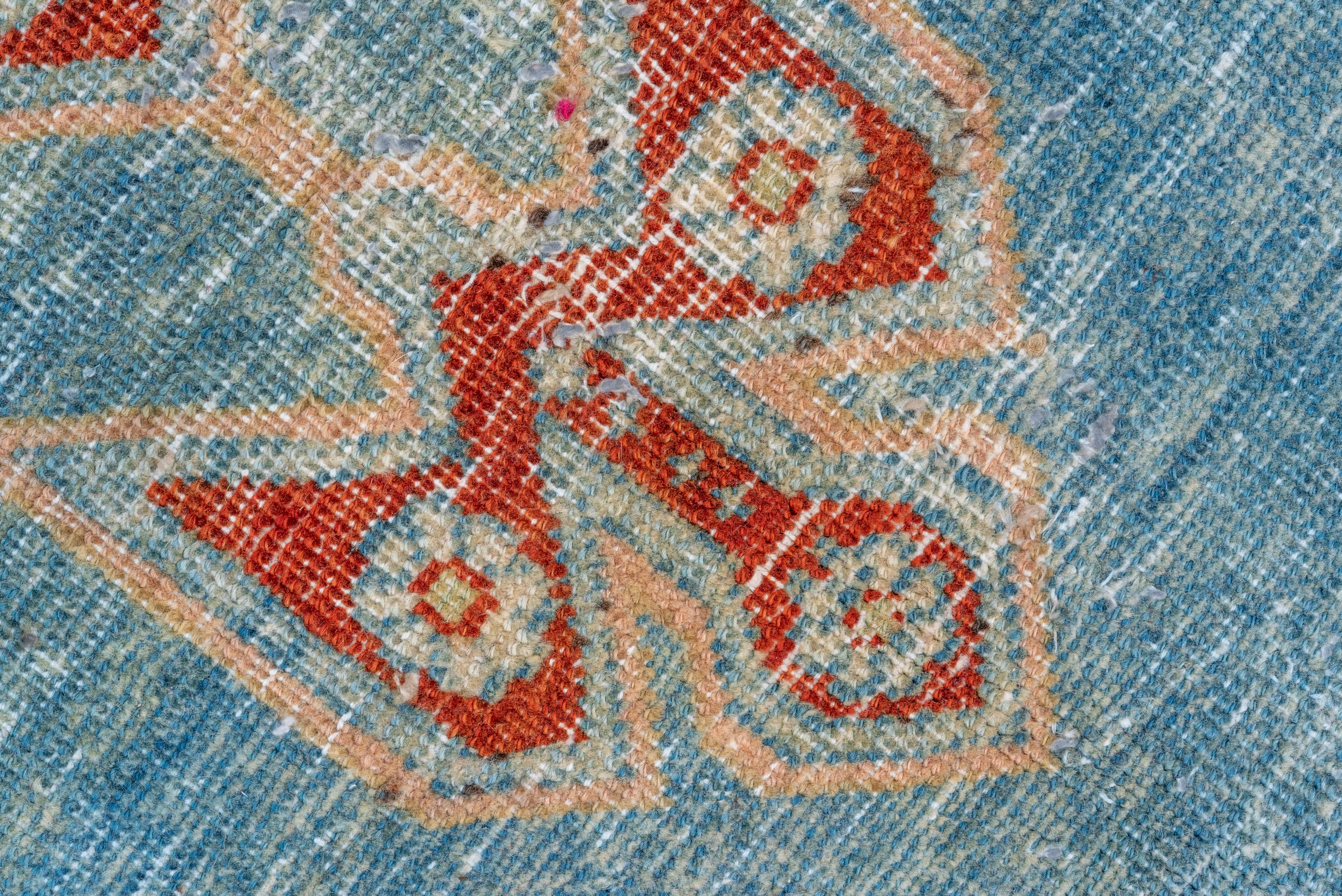 Début du 20ème siècle Fine tapis Tabriz ancien coloré, champ intérieur bleu, champ extérieur à fleurs rouges en vente
