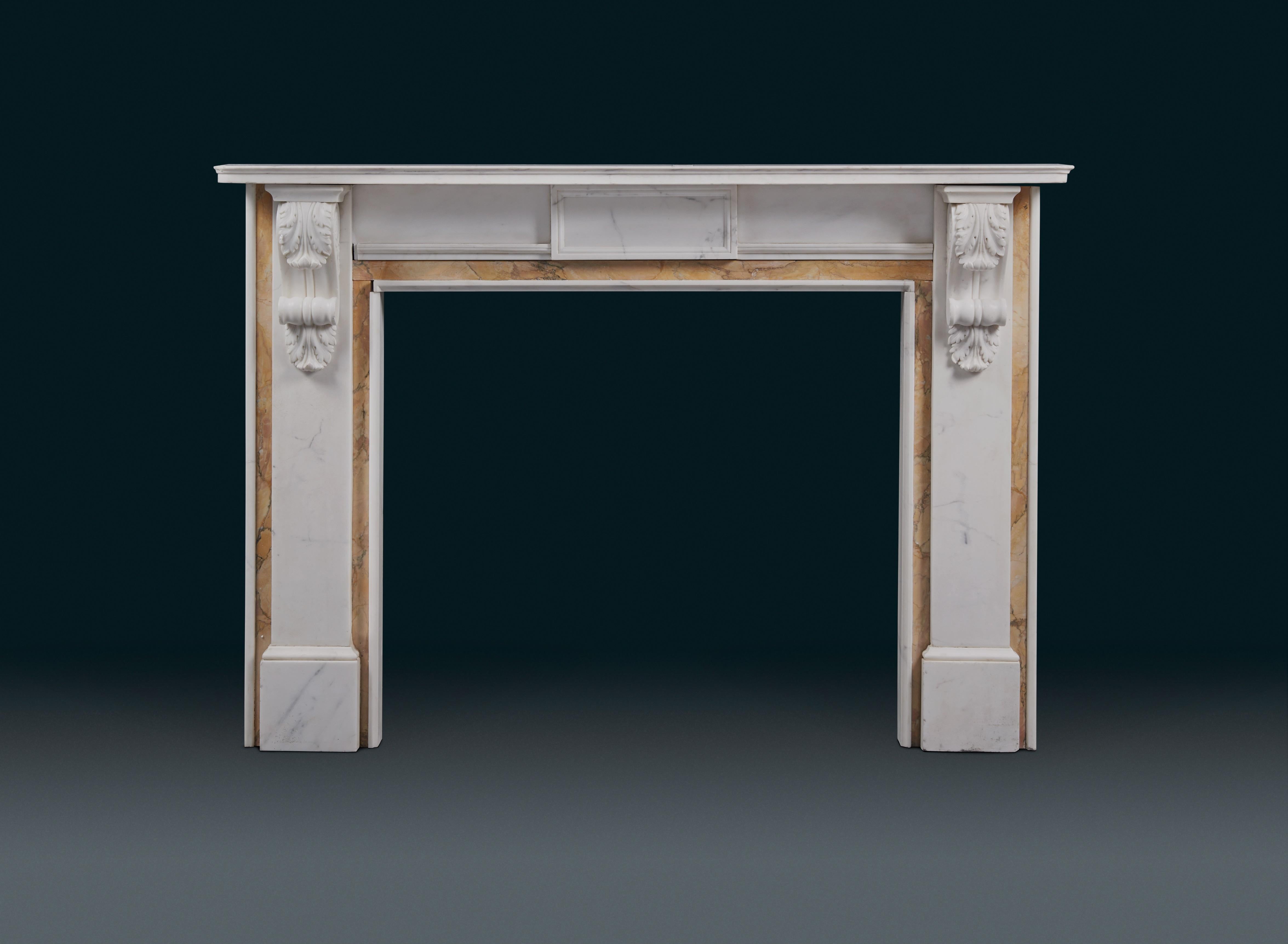 A 19th century, antique Victorian Siena and veined marble fireplace, the rectangular shelf with rounded corners above the panelled frieze, the pilaster jambs headed with ogee acanthus decorated brackets, the opening framed by Siena edged in white