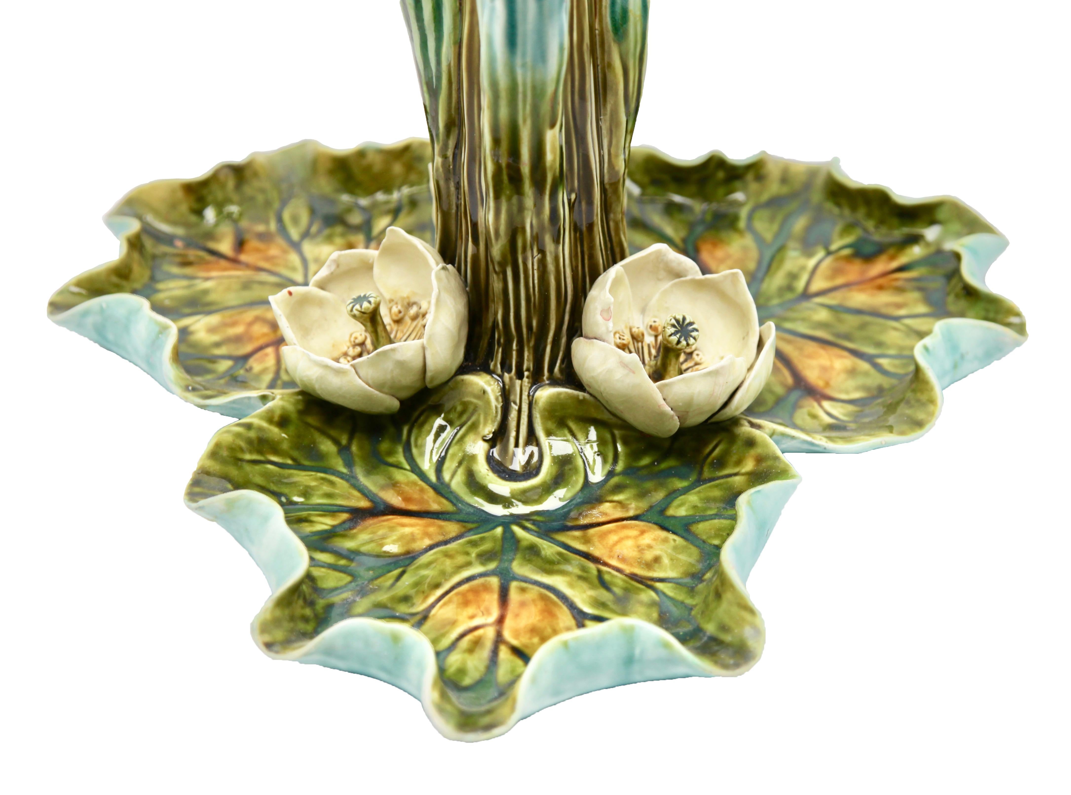 Fine antique French Majolica centerpiece Frie Onnaing, circa 1900

Up for your consideration is a gorgeous and large Frie Onnaing (France) Majolica centerpiece. French tri-part centerpiece consisting of life-size irises, tulips and lotus blossoms