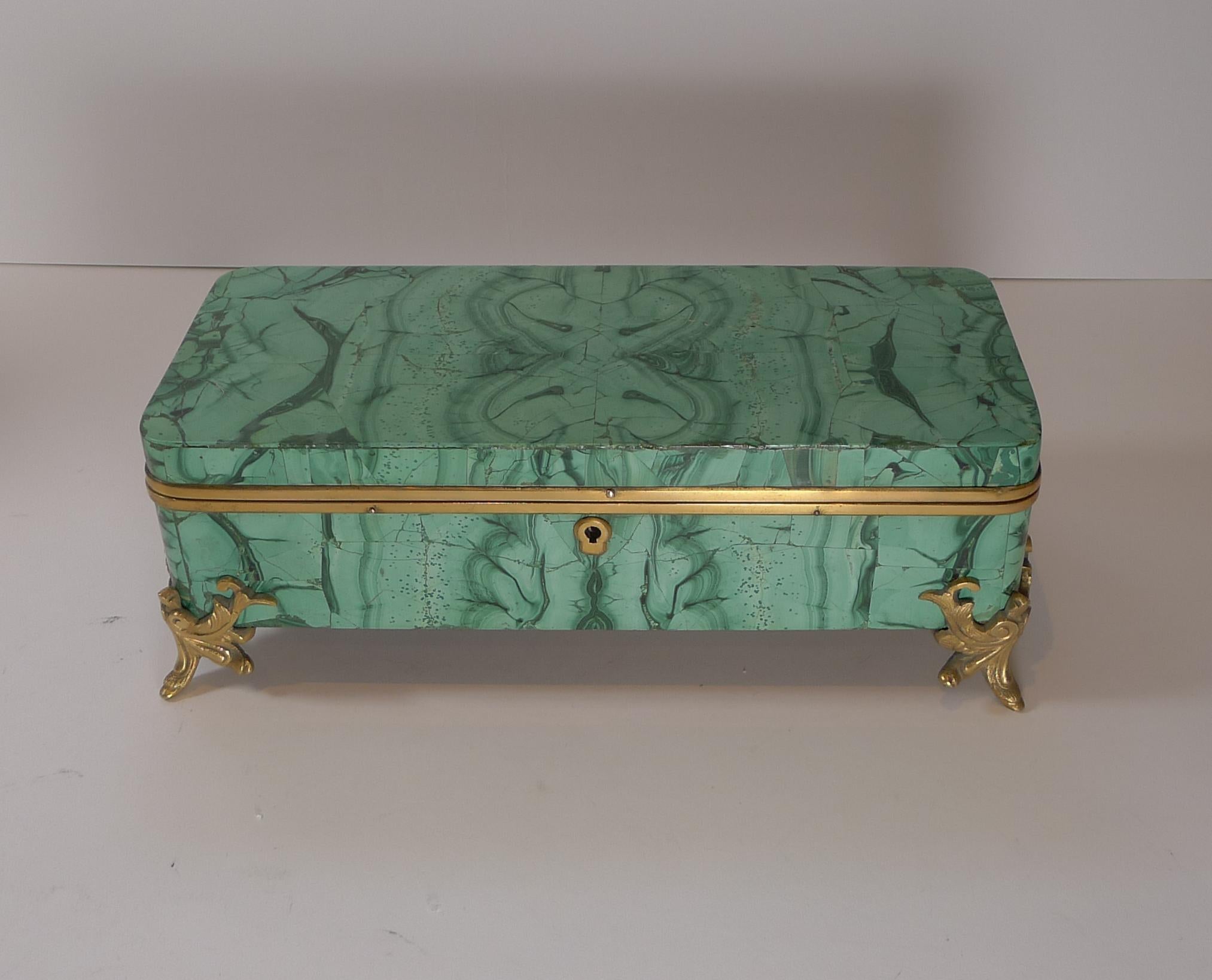 A truly fabulous late nineteenth century jewelry box made from a fine example of malachite, the first image is the most true colour in person.

The Malachite during this era was aggressively mined in the Ural Mountains of Russia so I suspect the