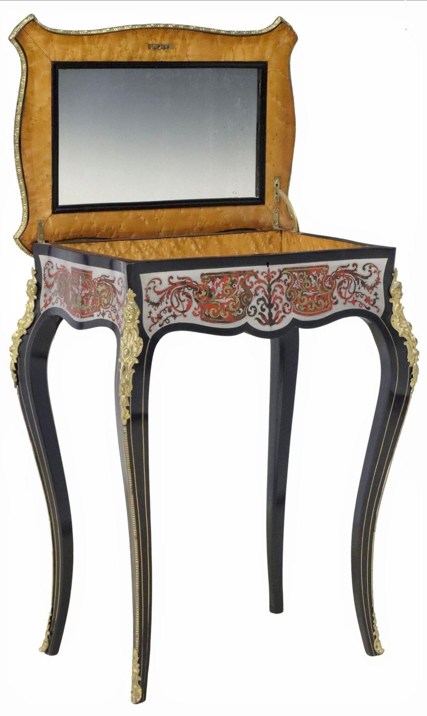 A rare French Napoleon III Second Empire Period (1852-1870) Boulle marquetry table. 

France, almost certainly Parisian work, Mid-19th Century, executed in sophisticated Louis XV taste, featuring brilliant gilt bronze ormolu mounted ebonized wood