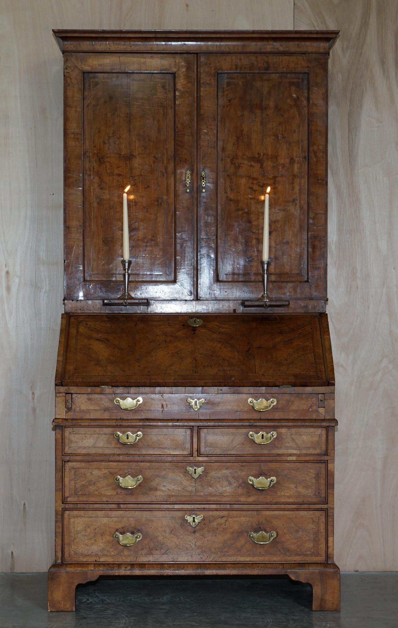 We are delighted to offer for sale this very fine Burr Walnut & Brass George II circa 1740 Library Bureau Bookcase with campaign handles 

A very good looking and well made piece, the timber patina is simply glorious, it has the original candle