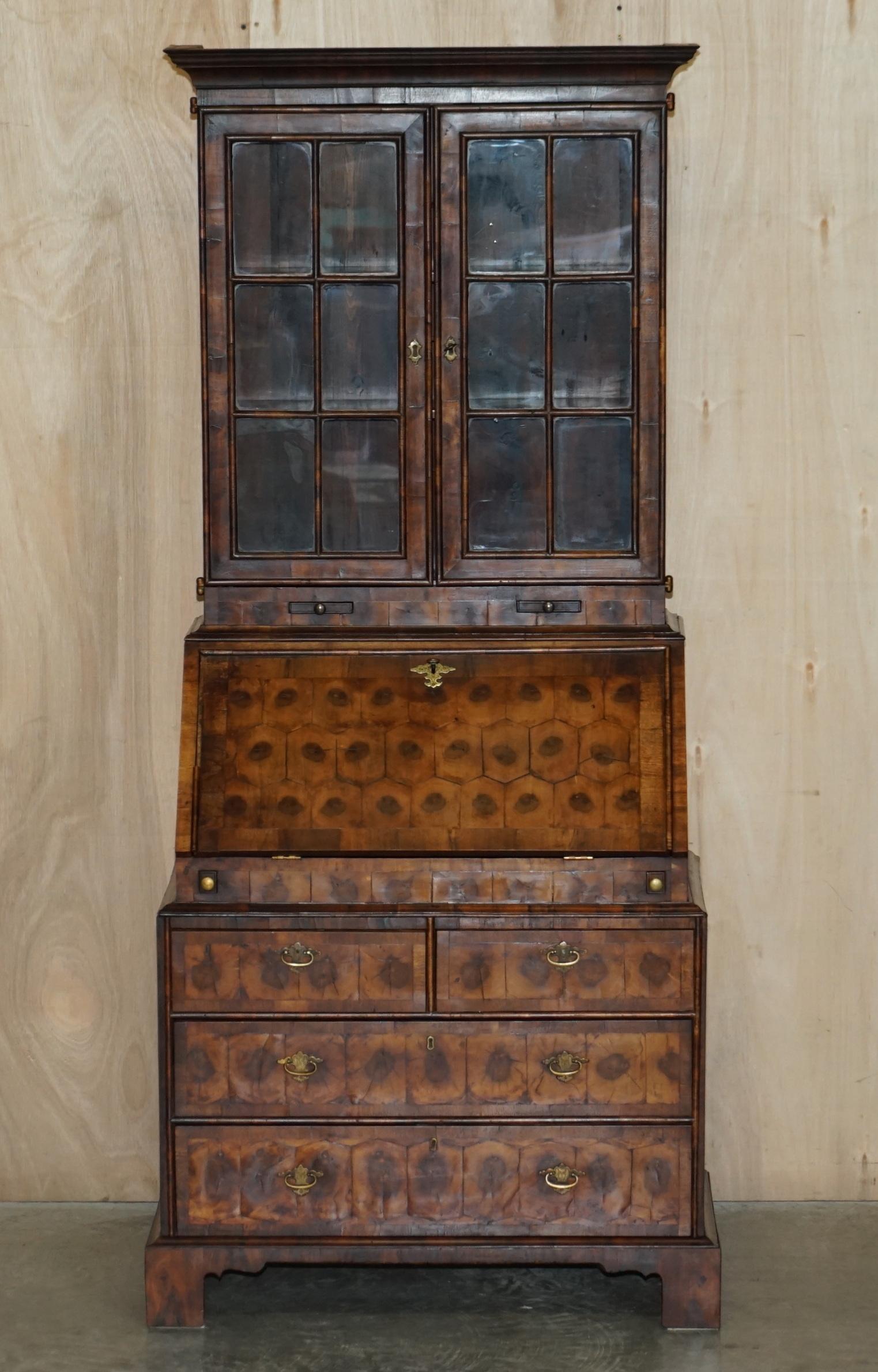 We are delighted to offer for sale this very fine and important Georgian circa 1780 Oyster veneer Bureau bookcase with original candle holders

A highly decorative and important bureau bookcase dating to the latter part of the 18th century. The