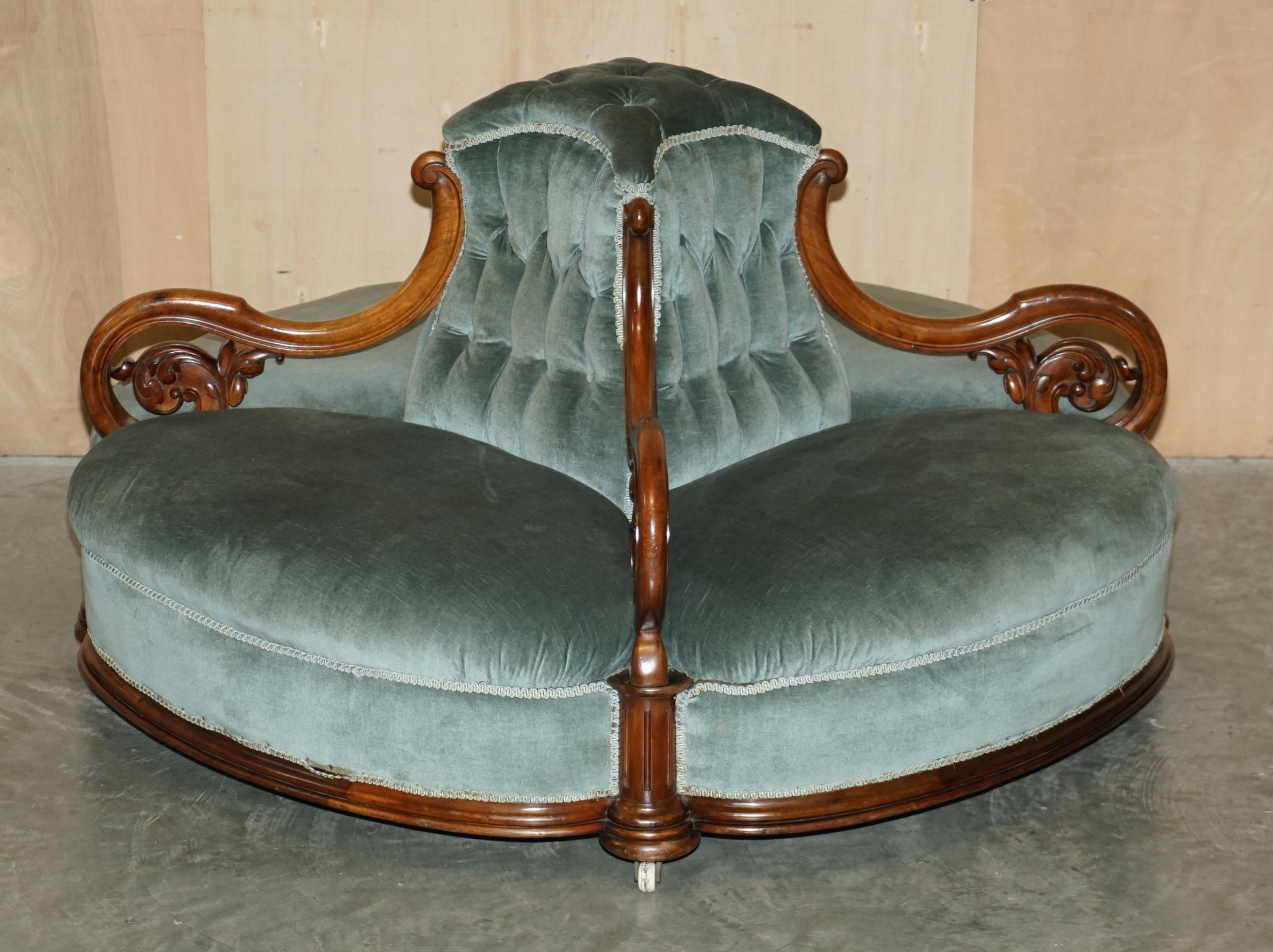 We are delighted to offer for sale this very rare and highly collectable circa 1870 hand cared Walnut framed Conversation couch 

This sofa is pure art furniture, it looks elegant and sophisticated in any setting, ideally suited to a large