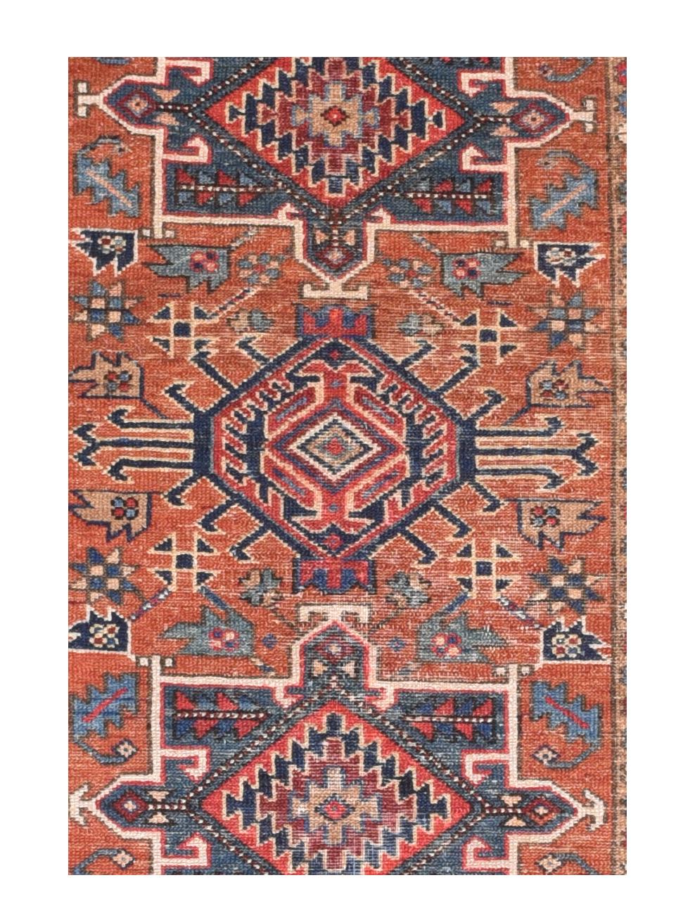 Fine antique Heriz Persian rug, hand knotted, circa 1890

Design: Three Medallion

Heriz rugs are Persian rugs from the area of Heris, East Azerbaijan in northwest Iran, northeast of Tabriz. Such rugs are produced in the village of the same name