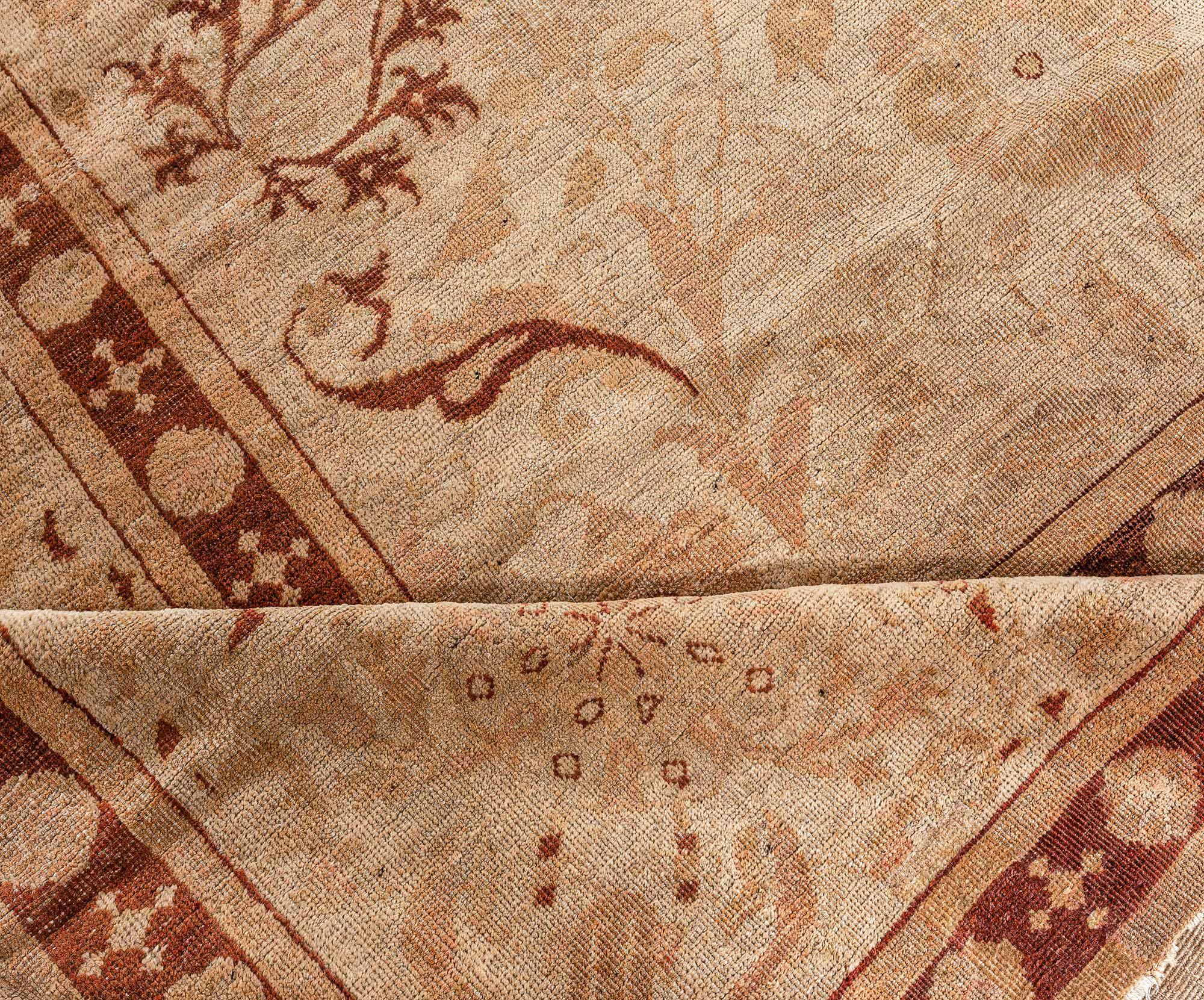Antique Indian Amritsar Beige handmade wool rug
Size: 13'8
