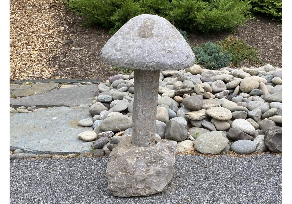 A large and striking Japanese Garden Mushroom in carved stone with Grey Painted surface. There is a chip to the Mushroom Head rim (Please see detail photos) however the Sculpture displays exceptionally well. 
In China and Japan, mushrooms were