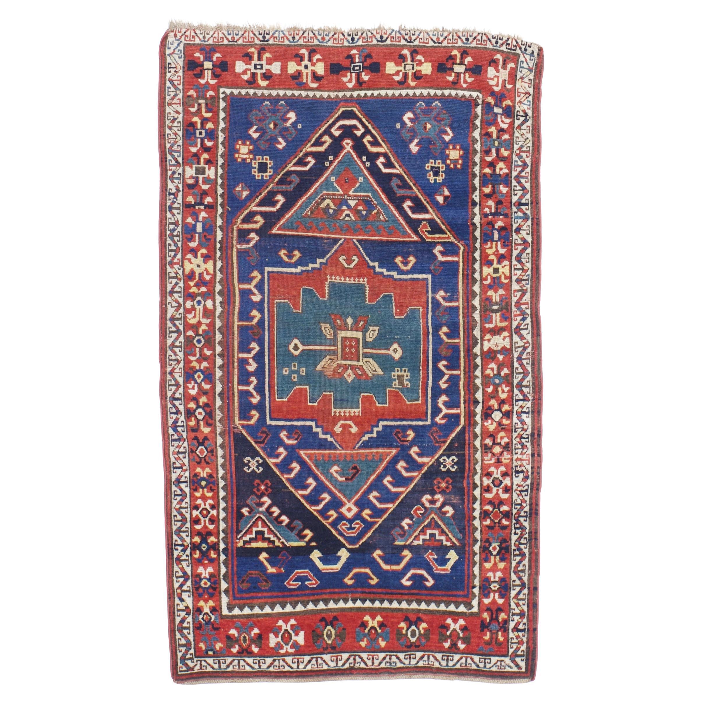 Tapis Kazak antique 3'10" x 6'8" (en anglais)