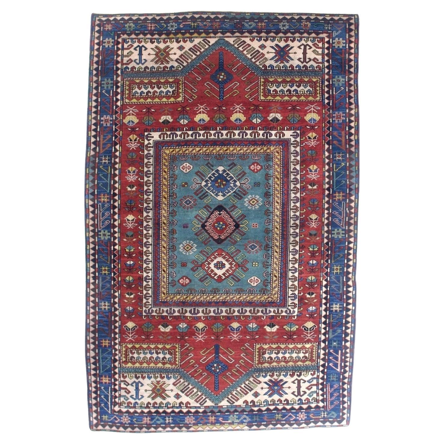 Feiner antiker Kazak-Wollteppich 5'1" x 7'11"