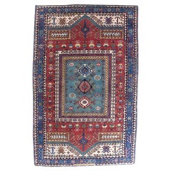 Feiner antiker Kazak-Wollteppich 5'1" x 7'11"
