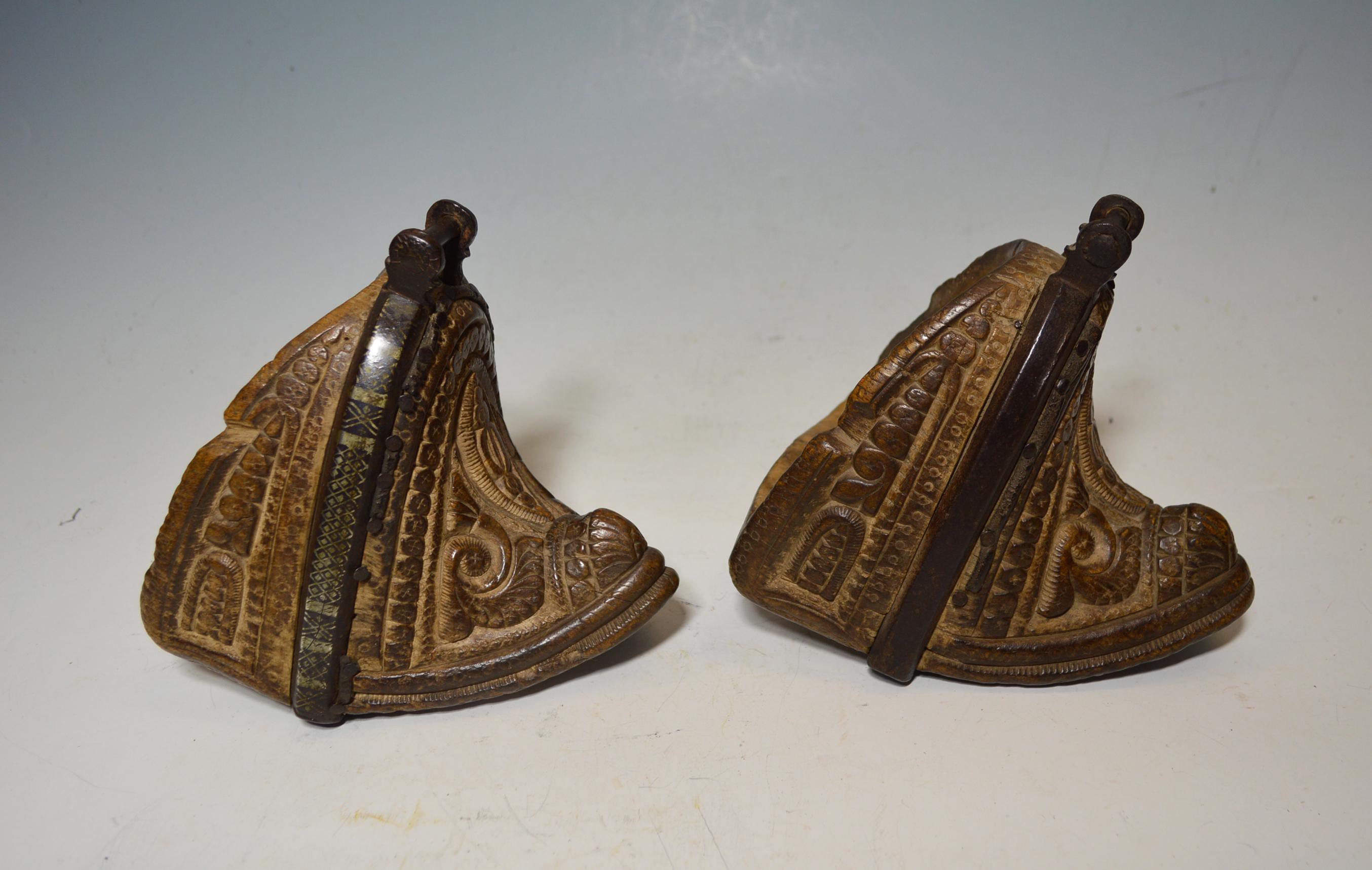 Fine pair of antique Latin American carved wood gaucho equestrian stirrups

A particularly fine old pair of fine carved wood and metal stirrups from the Gaucho of Argentina 

Good pieces for interior design elements or home decoration

Period: