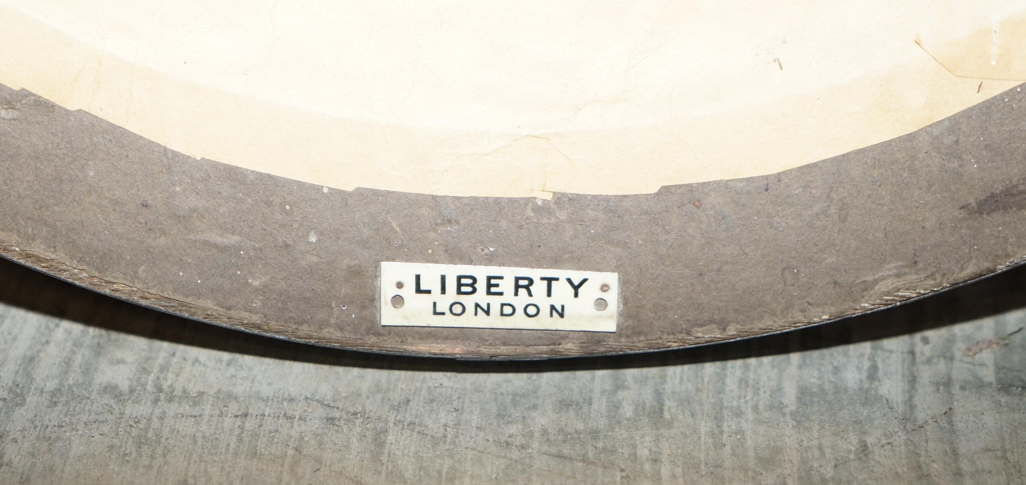 We are delighted to offer this stunning Liberty’s London hand hammered pewter round wall mirror with thick glass plate and original Liberty’s London plaque to the rear

This mirror is truly sublime, the hand hammered pewter frame is an absolute