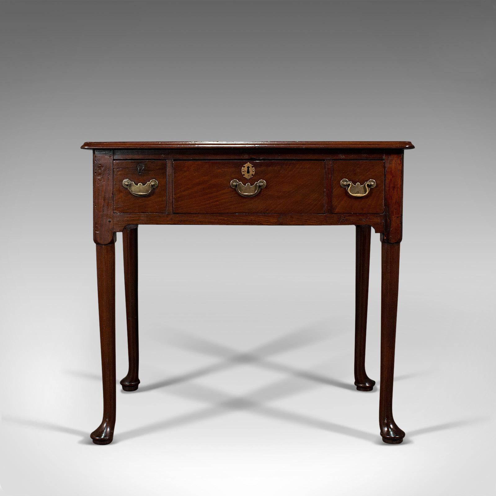 This is a fine antique lowboy. An English, mahogany side or serving table, dating to the Georgian period, circa 1780.

Delightful finish and proportion from the heart of the Georgian period
Displaying a desirable aged patina and in good