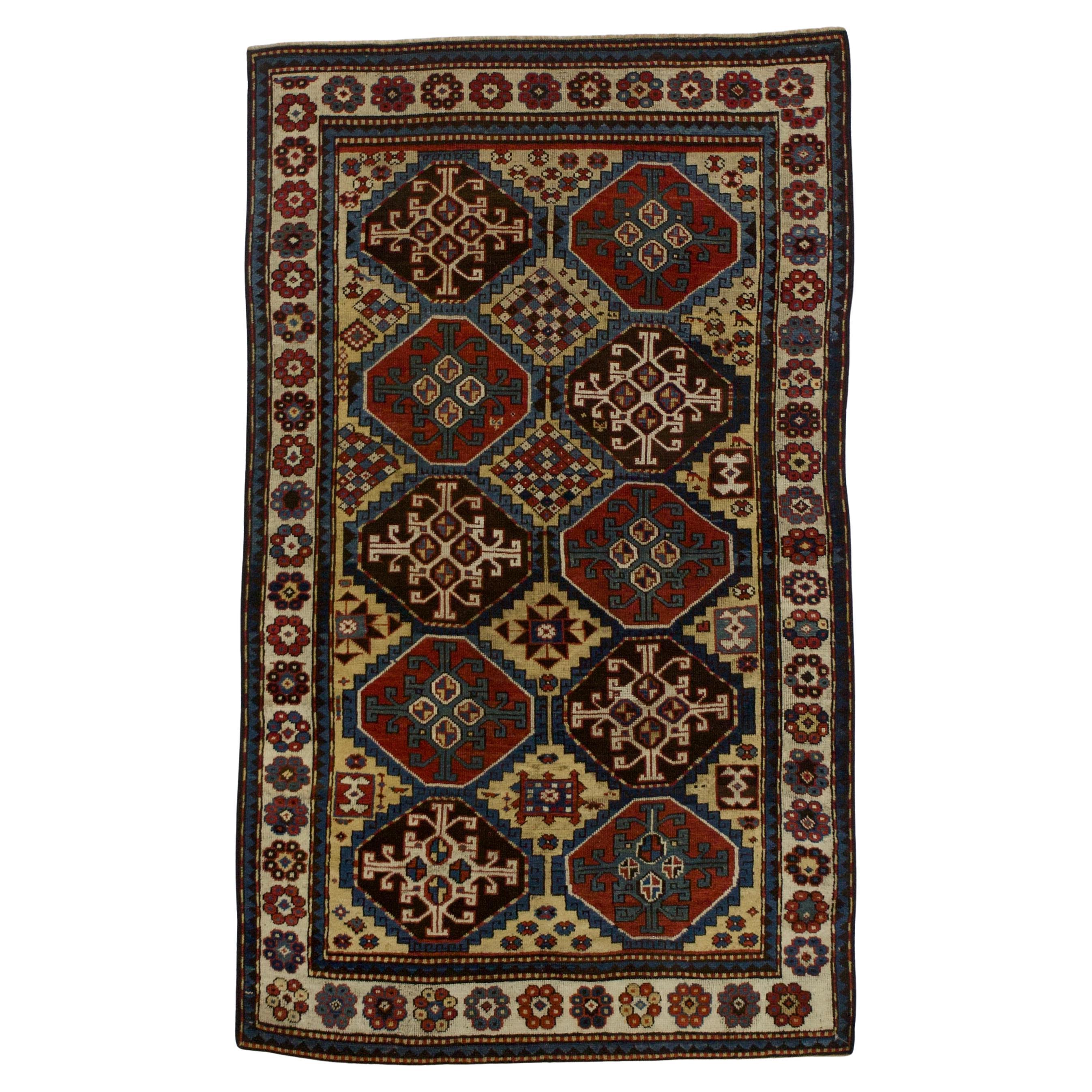 Fine Antique Mogul Kazak Rug 4’7" x 7’7"