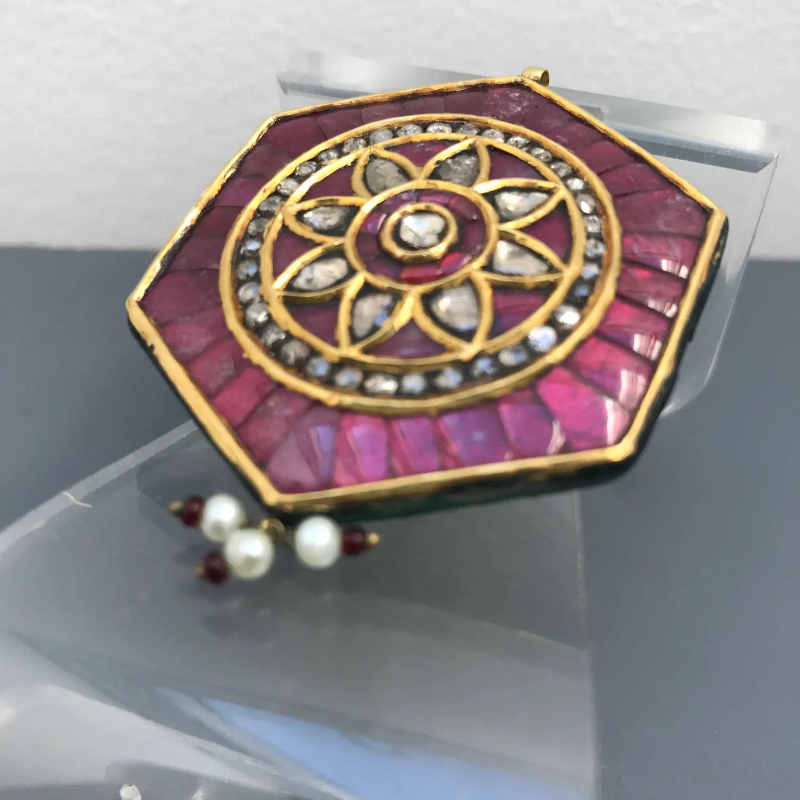 ABSOLUTELY STUNNING  LARGE  Mughal / Mogul  18kt gold pendant with genuine irregular size rose cut diamonds and ruby insert . Pendant back is also very beautifully made with multi colored enamel work .
These type of Mughal jewelry is usually wax