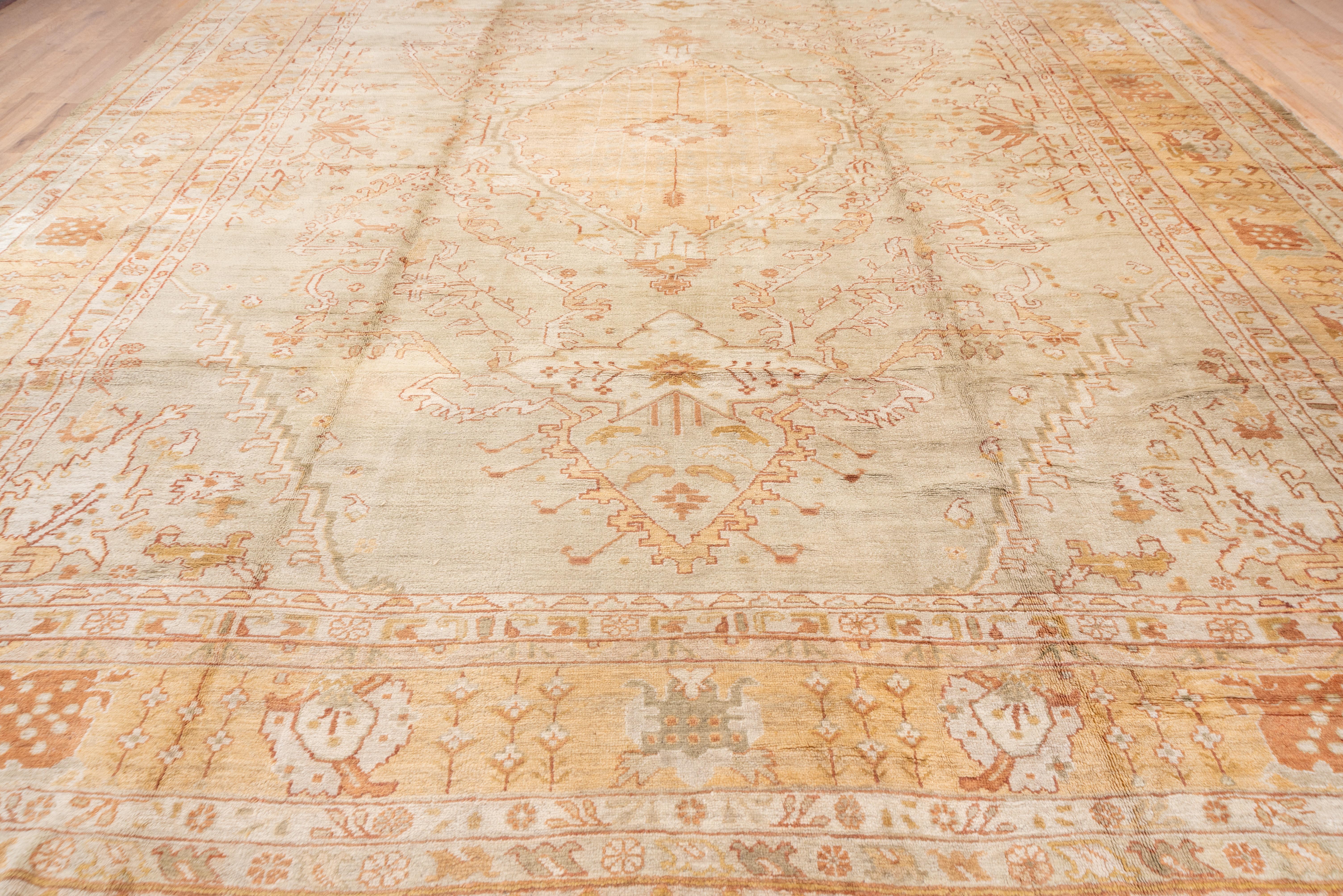 Hand-Knotted Fine Antique Oushak Carpet, Seafoam Allover Field, Gold Borders, Orange Accents For Sale
